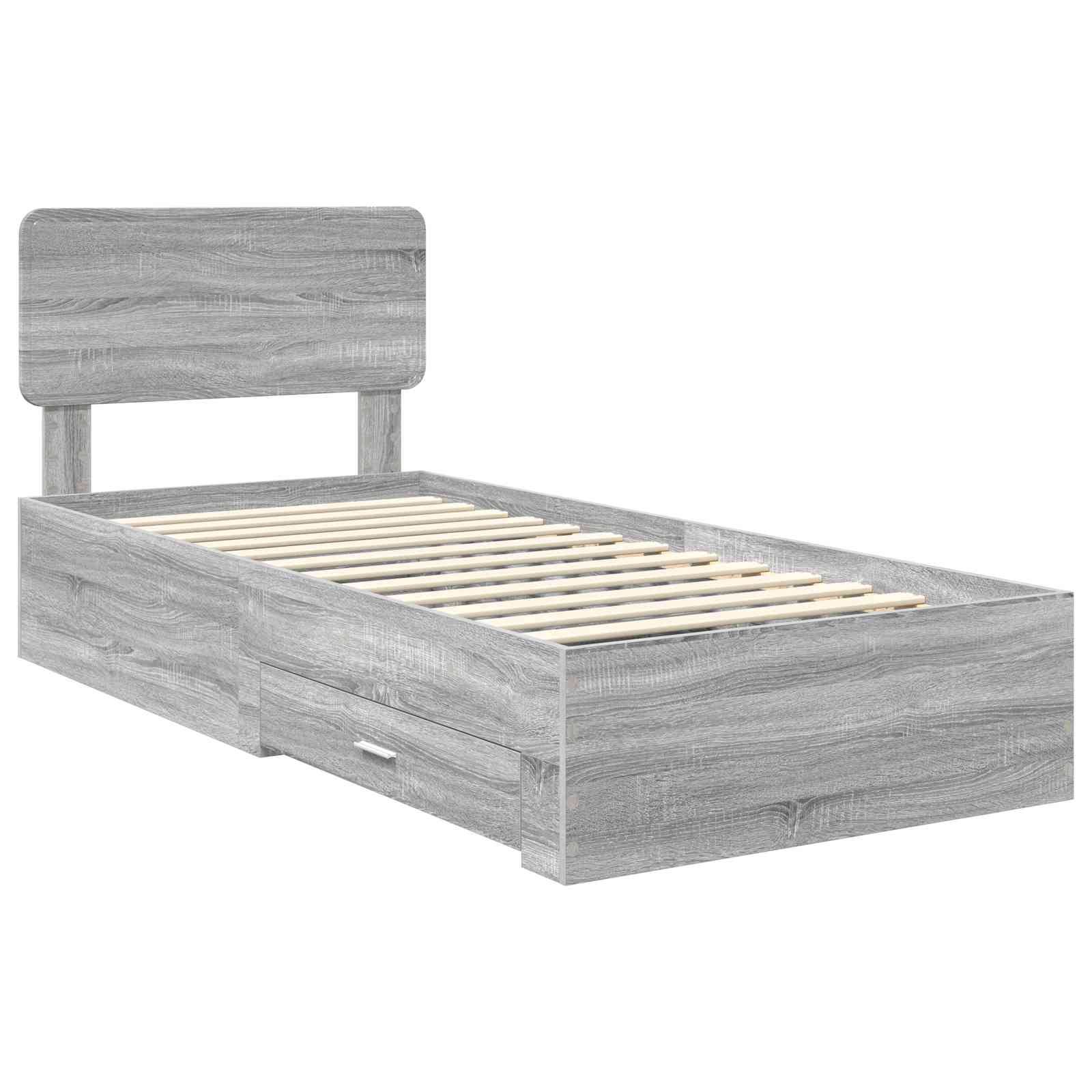 Ein Holz-Einzelbettrahmen mit grauer Beschichtung, ausgestattet mit einem Lattenrost und einem massiven Kopfteil. Eine Schublade ist in die Basis eingebaut, um Stauraum zu bieten.