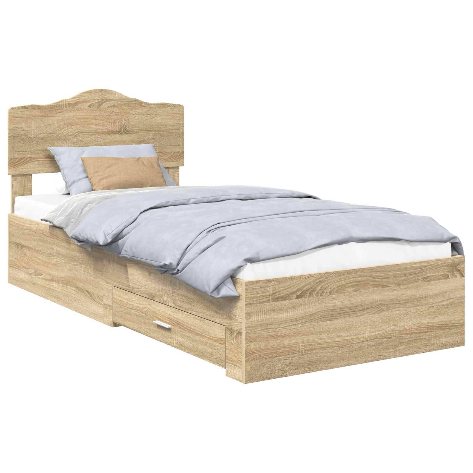 Ein Holzbett in Einzelgröße mit einem geschwungenen Kopfteil, hellblauen Bettwäschestücken und zwei sichtbaren Schubladen darunter.