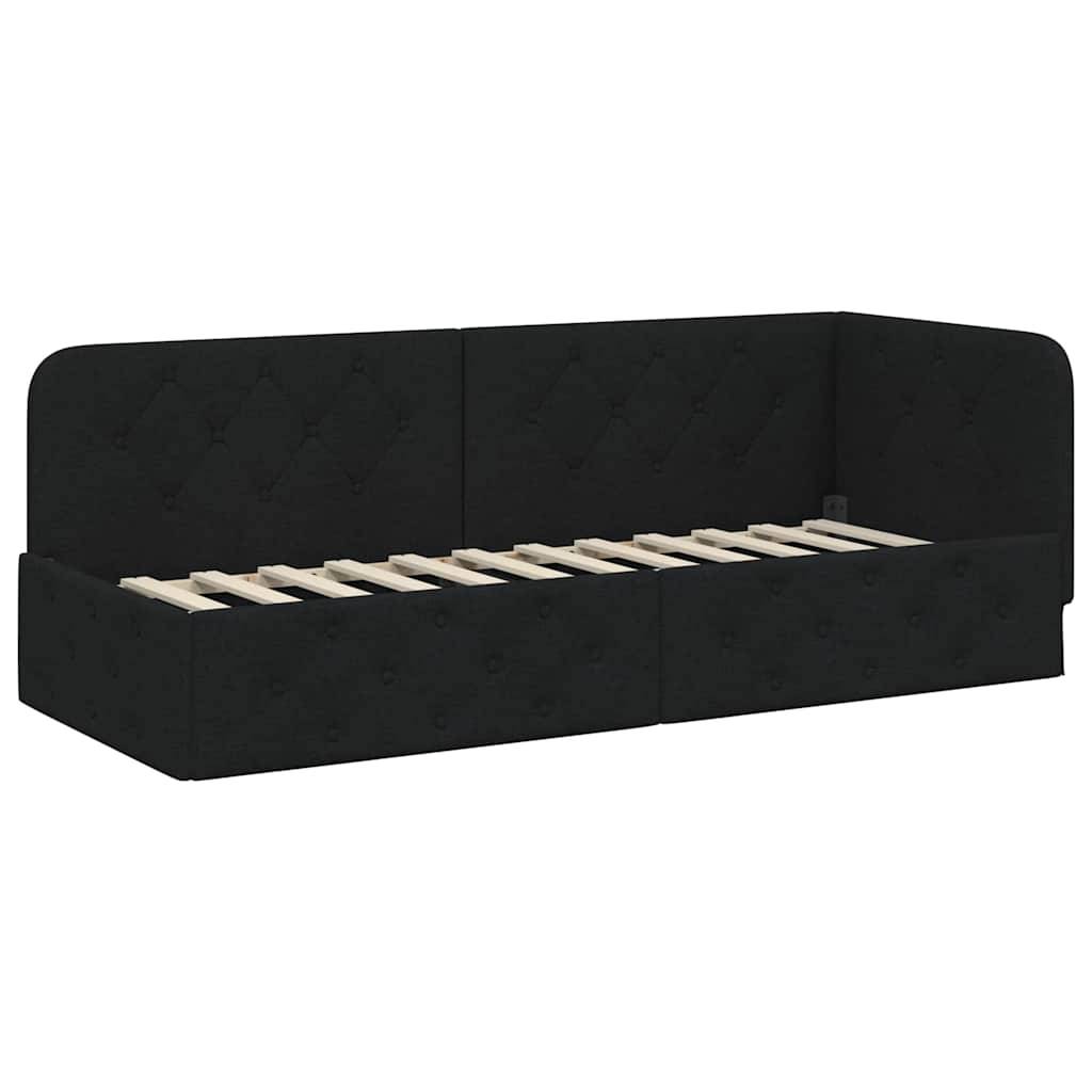 Ein schwarzes gepolstertes Tagesbett mit Rückenlehne und Staurageschubladen, versehen mit einer Rautensteppung und Holzlatten zur Matratzenunterstützung.