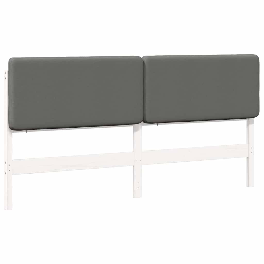 Ein grau gepolsterter Kopfteil mit schlichtem, modernem Design auf einem weißen Rahmen, geeignet für ein Kingsize-Bett.