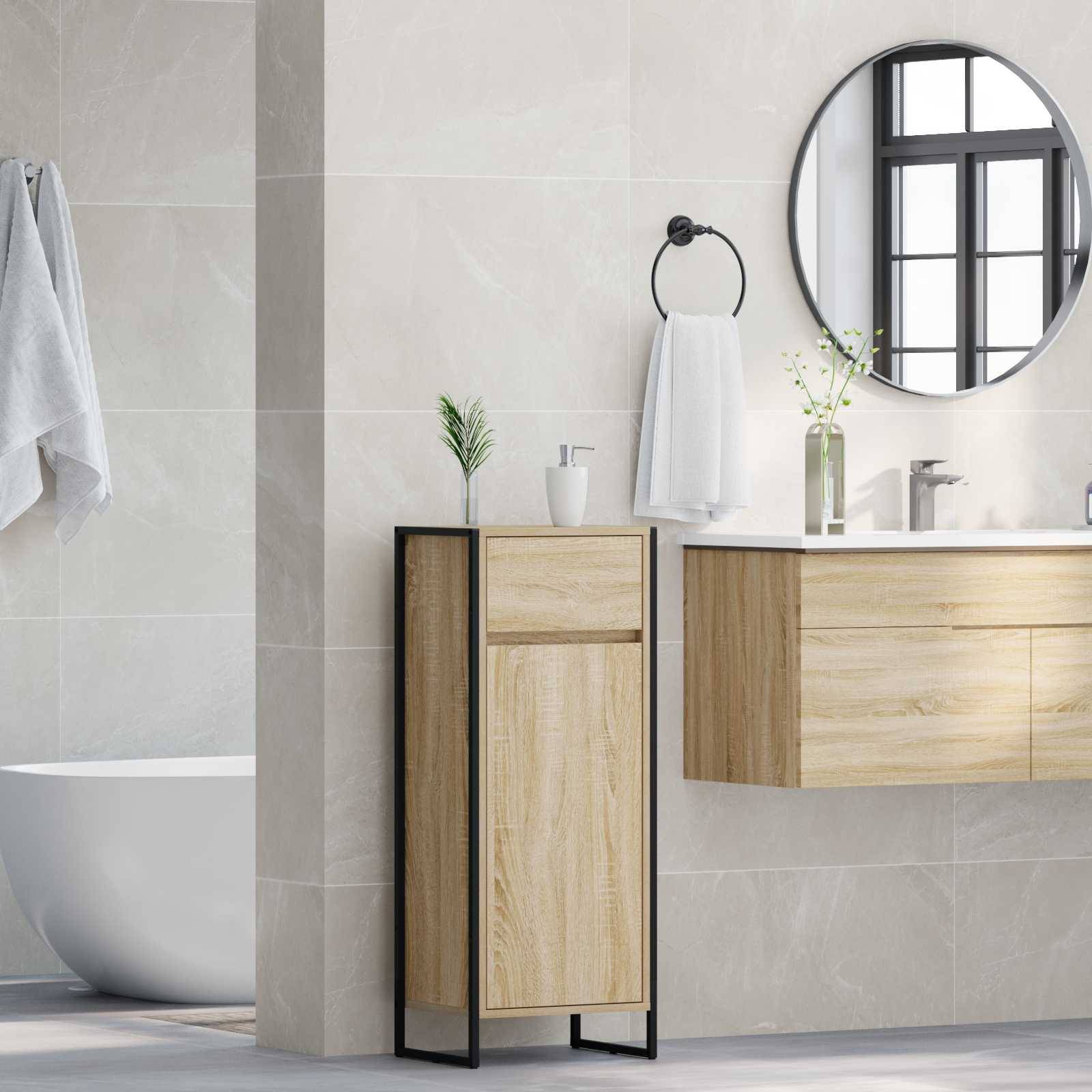 Modernes Badezimmer mit beigen Fliesen, einem runden Spiegel und einem Waschtisch aus Holz mit einem Waschbecken.Links ist eine freistehende Badewanne zu sehen.