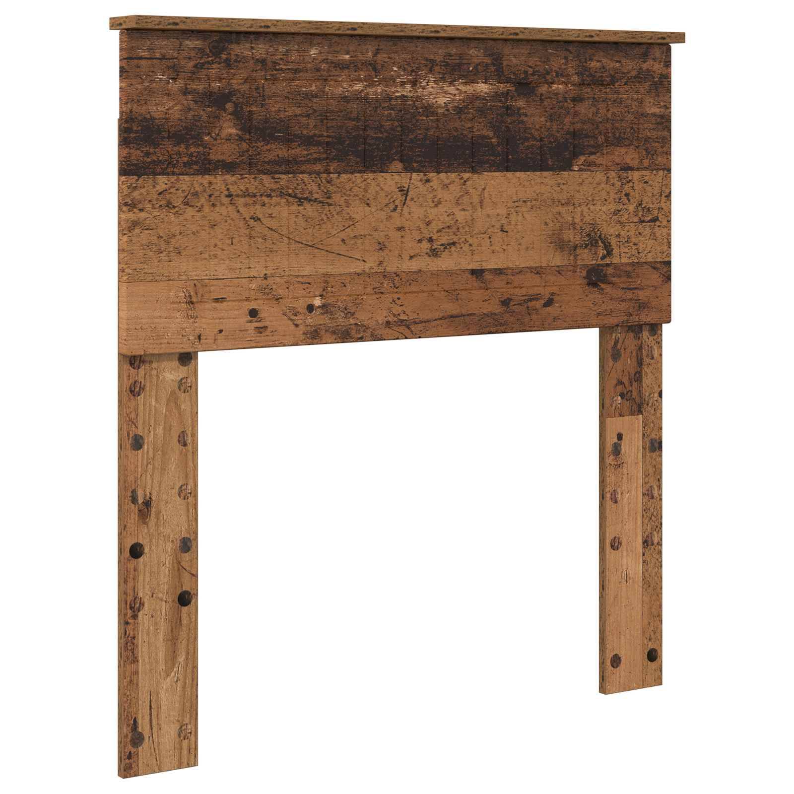 Ein rustikales Holzkopfteil mit angealterter Oberfläche, das ein Paneldesign und zwei robuste vertikale Beine aufweist; ideal für die Schlafzimmerdekoration.