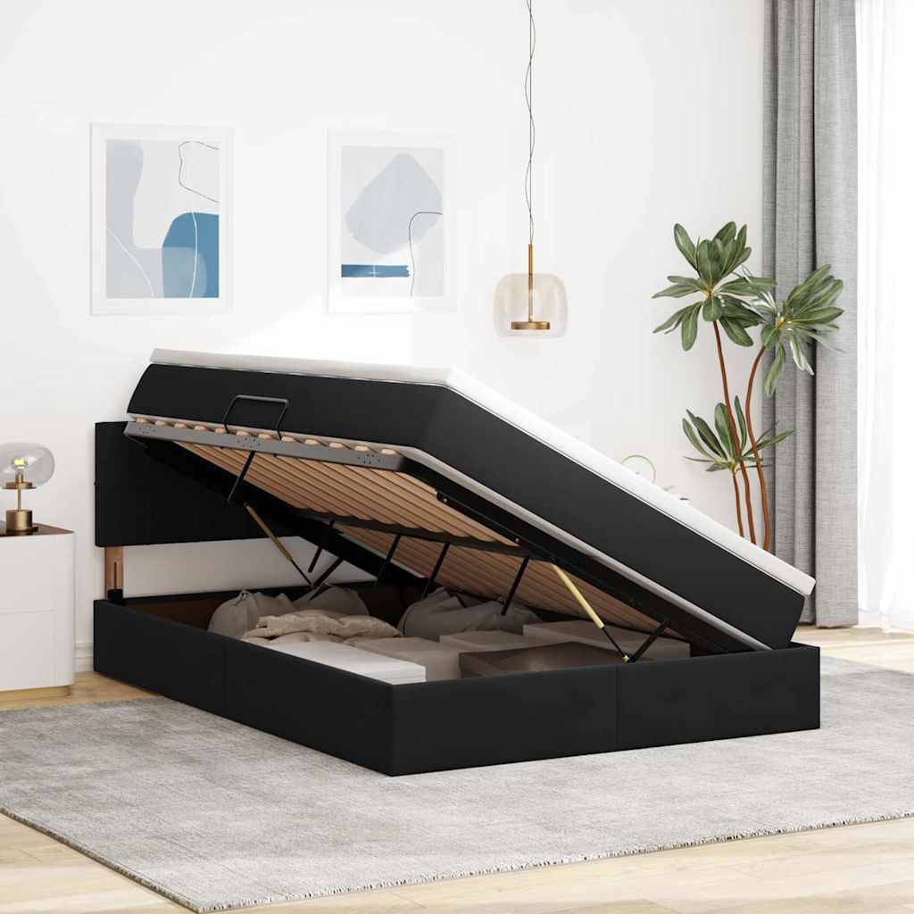 Ein modernes Schlafzimmer zeigt ein schwarzes Ottoman-Bett mit einem erhöhten Stauraum. Wandkunst und eine Zimmerpflanze bereichern die Raumgestaltung.