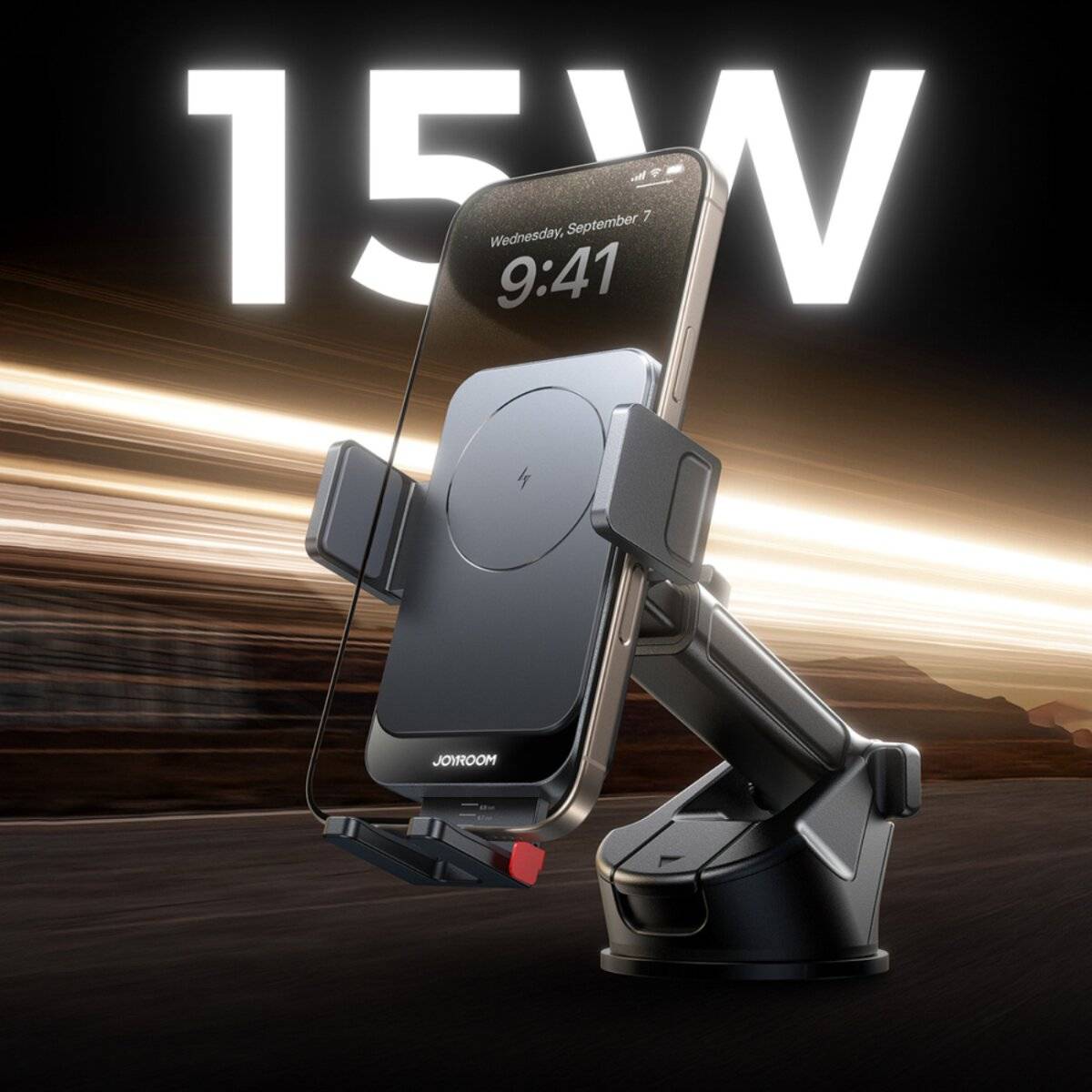 Ein Smartphone auf einem JOROOM drahtlosen Autoladegerät, das eine Ladegeschwindigkeit von '15W' anzeigt. Der Hintergrund deutet auf Bewegung oder Geschwindigkeit hin.