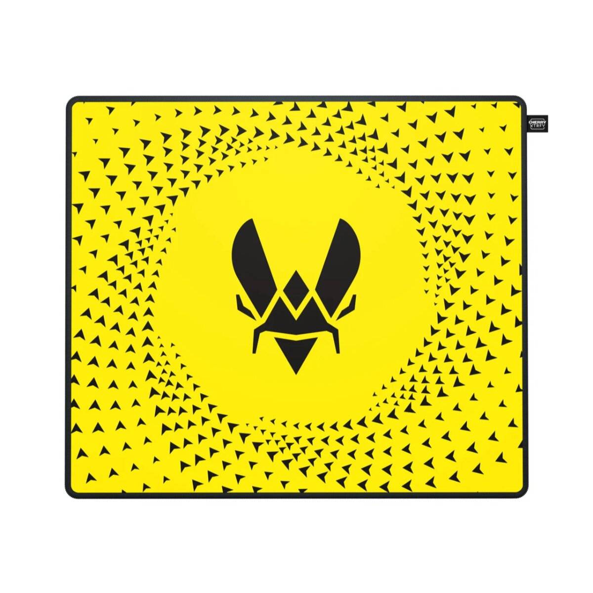 Eine gelbe Matte mit einem symmetrischen schwarzen Logo in der Mitte, umgeben von einer spiralförmigen Anordnung kleiner schwarzer Dreiecke.