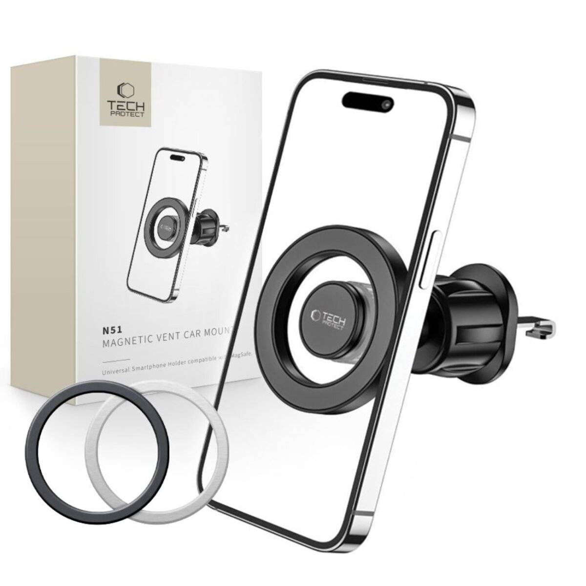 Auf einer Lüftungsöffnung eines Autos montiertes Smartphone mit einem Produktkarton, der dieselbe Anordnung zeigt. Zwei kreisrunde Metallplatten sind ebenfalls zu sehen.