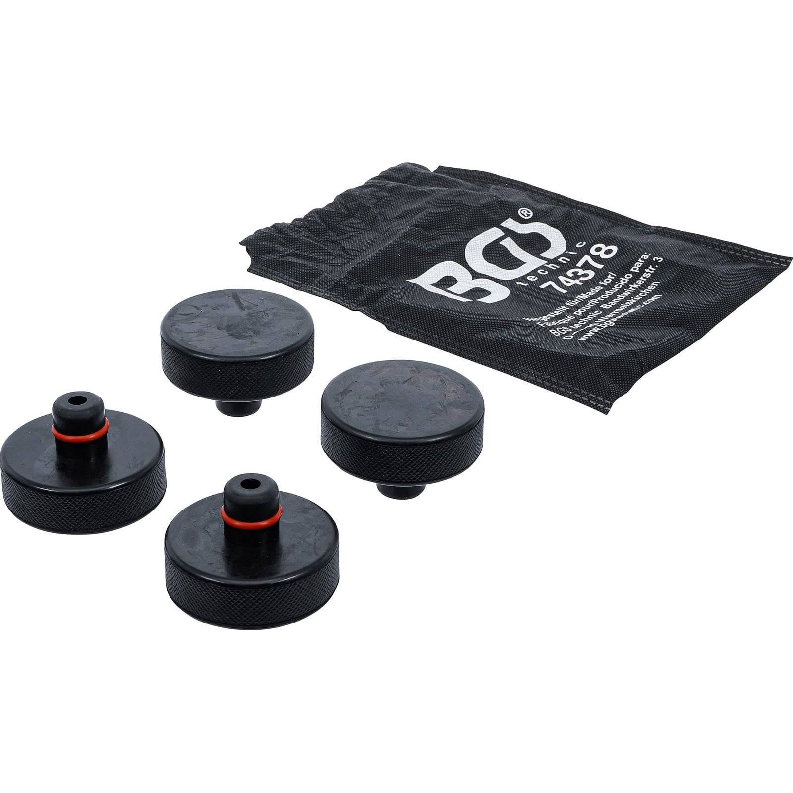 Vier schwarze Hebepads mit roten Akzenten neben einer schwarzen Tasche mit der Beschriftung 'BGS 7431-8', die für Fahrzeugwartung oder -reparatur verwendet wird.