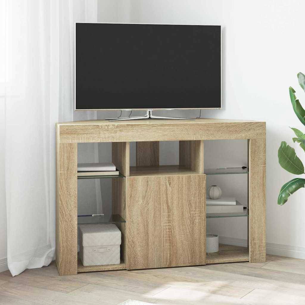 Ein Flachbildfernseher steht auf einem hellen Holz-Eckregal in einem hellen Raum. Regale darunter beherbergen Bücher und einen kleinen Globus. Eine Pflanze steht in der Nähe.
