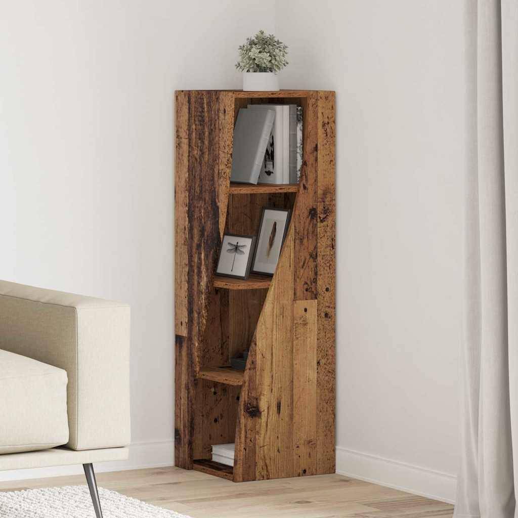 Ein rustikales Holzbücherregal mit Zickzack-Design, teilweise mit Büchern gefüllt und einer Topfpflanze auf der Oberseite, steht in einem modernen Wohnzimmer.