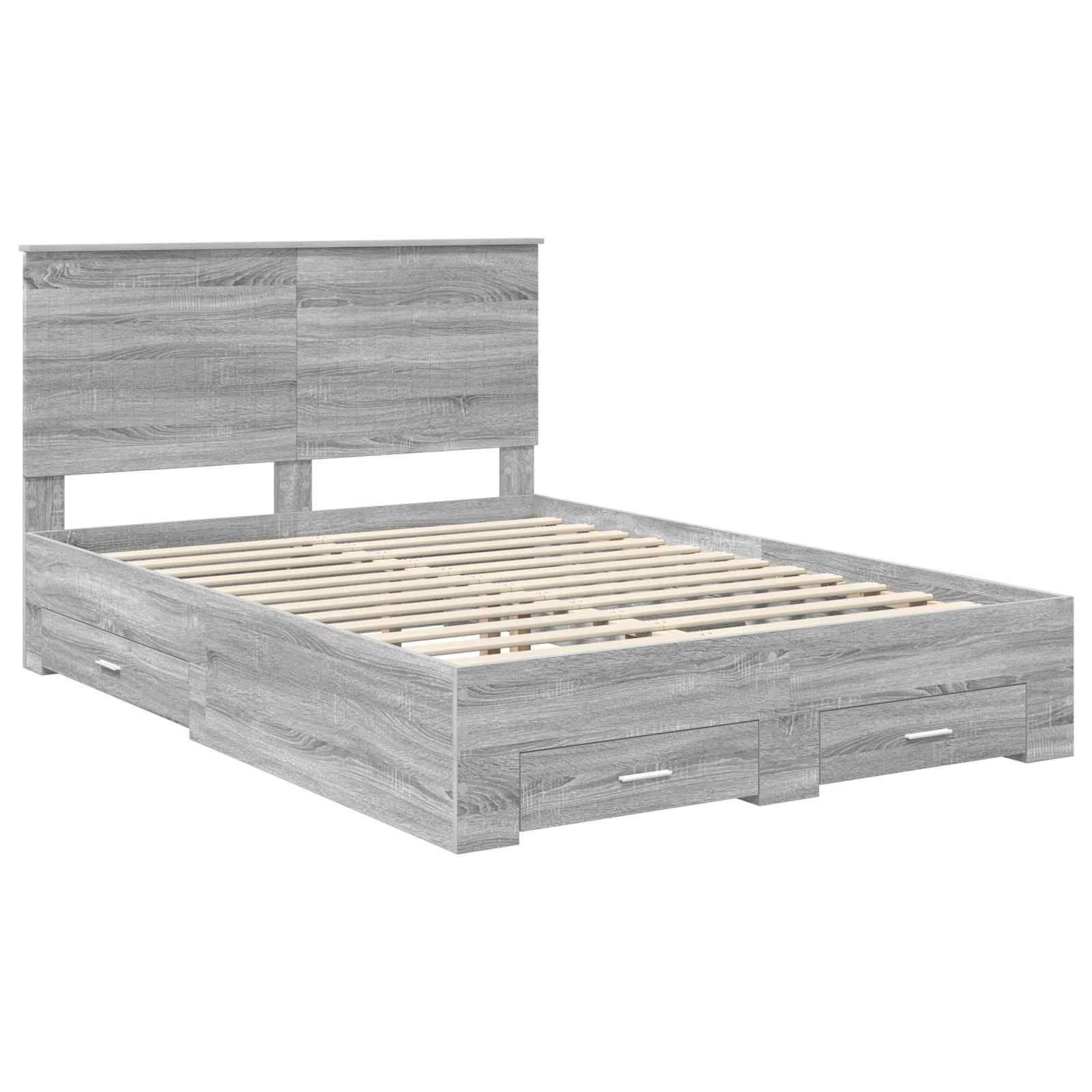 Ein modernes graues Holzbett mit hohem Kopfteil und Staurageschubladen darunter.