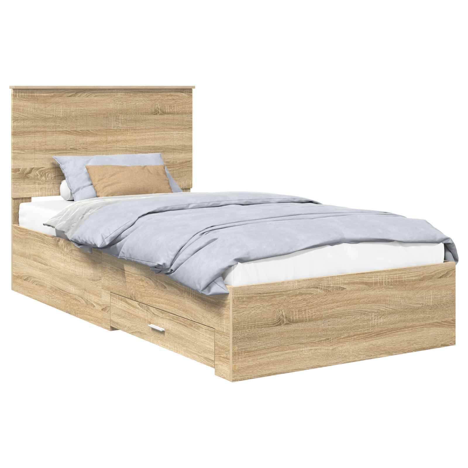 Ein Holz-Einzelbett mit hohem Kopfteil, blau-weißer Bettwäsche, einem beigen Kissen und Staurageschubladen darunter.