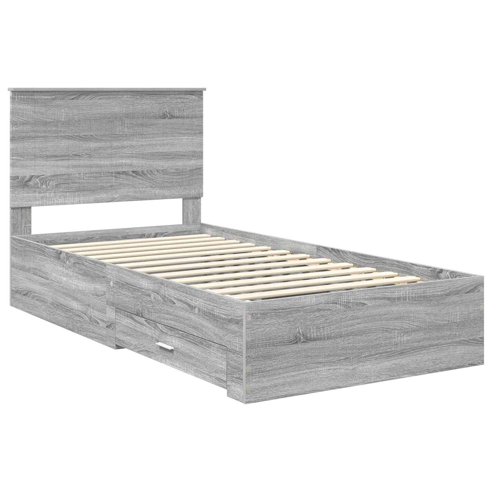Ein Holz-Einzelbettgestell mit hohem Kopfteil und integrierten Aufbewahrungsschubladen darunter, in einer hellen Graufarbe.