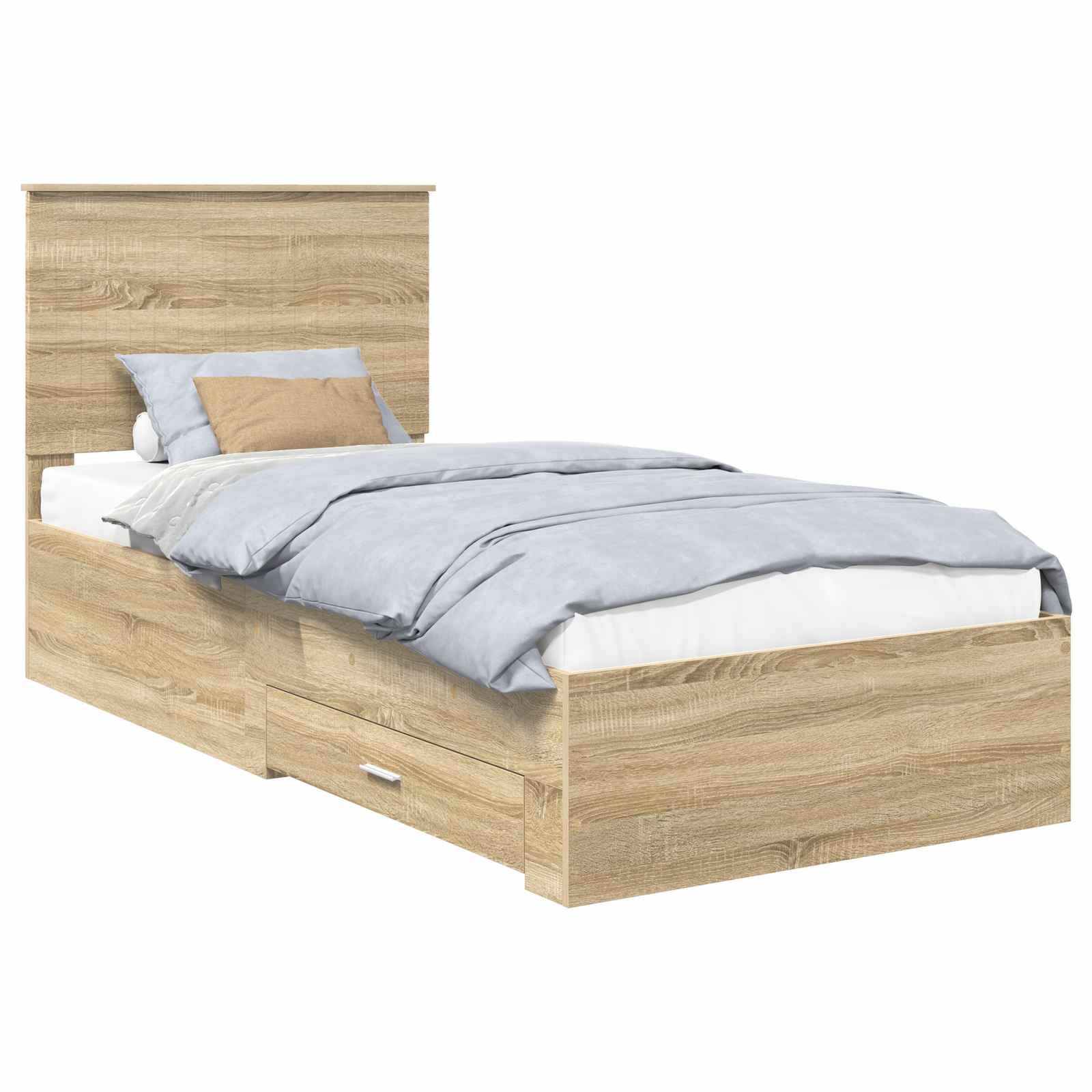 Ein Holzbettgestell mit einer hellbraunen Beschichtung, das eine hohe Kopfseite und zwei Schubladen darunter aufweist. Das Bett ist mit einer grauen Bettdecke und Kissen bezogen.