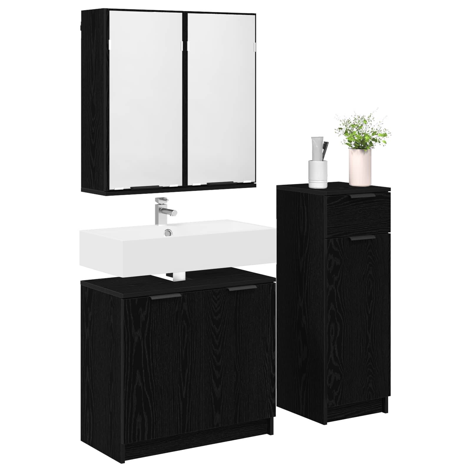 Ein modernes schwarzes Badezimmermöbel-Set mit einem rechteckigen Waschbecken, einem Spiegelschrank oben und einem Seitenschrank mit einer Pflanze darauf.