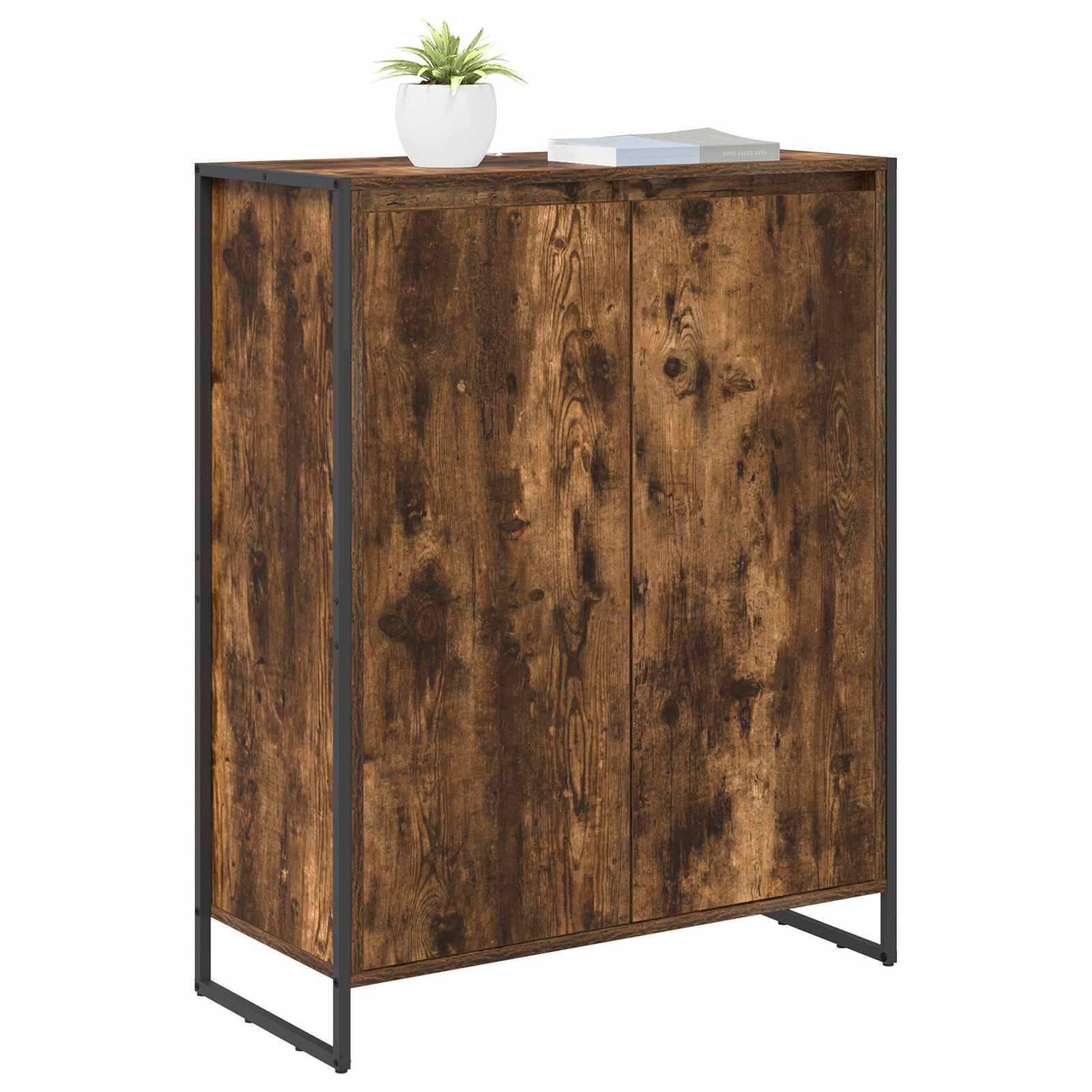 Ein Holzschrank mit rustikaler Oberfläche, ausgestattet mit zwei geschlossenen Türen. Eine kleine Topfpflanze ist oben darauf platziert, zusammen mit einem geschlossenen Buch.