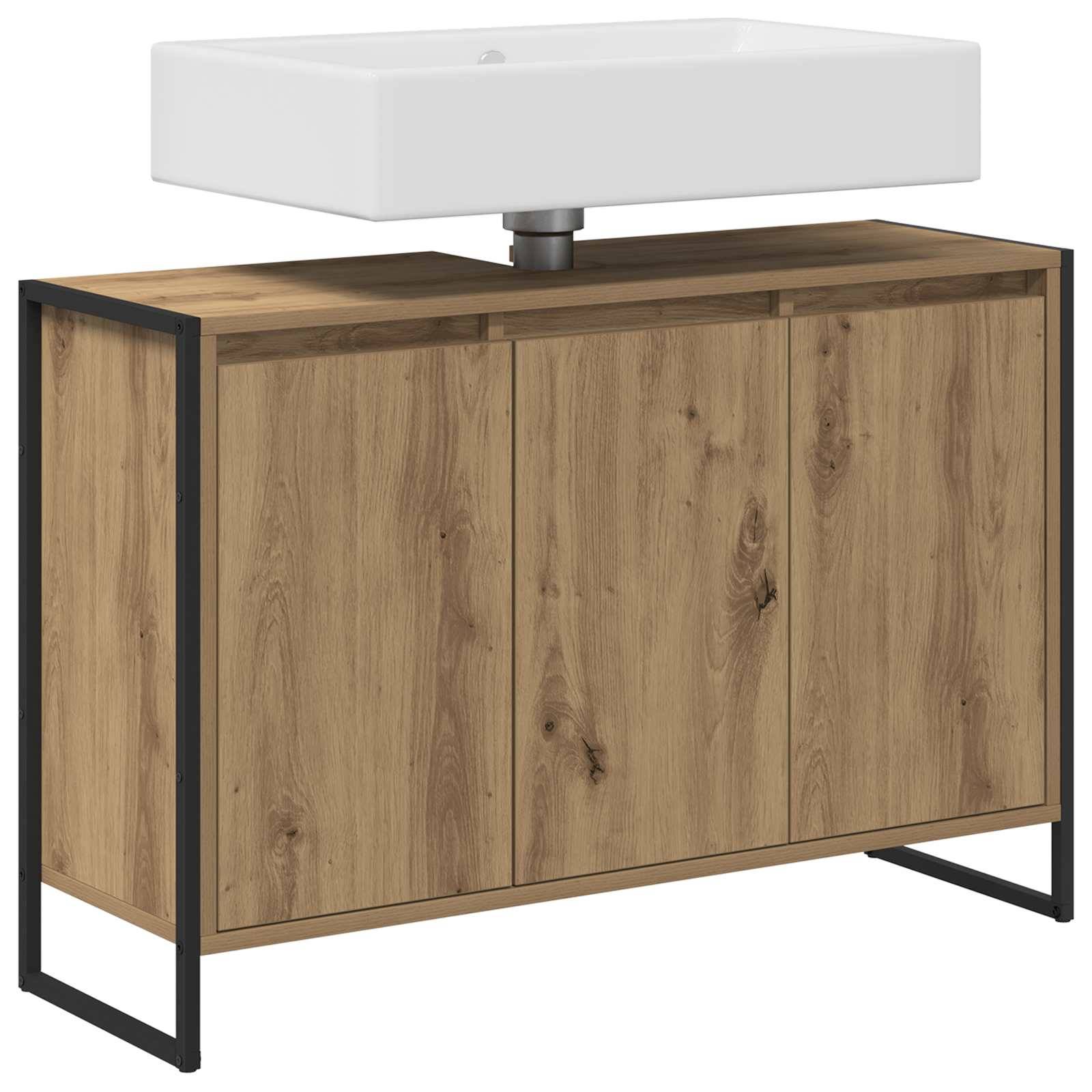 Ein hölzerner Waschtisch mit einem weißen rechteckigen Waschbecken oben drauf. Der Waschtisch verfügt über zwei Schranktüren und einen minimalistischen schwarzen Metallrahmen.