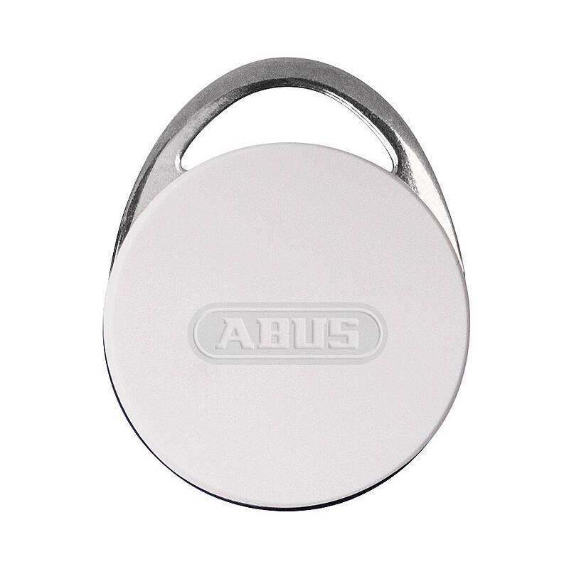 Eine weiße, runde Sicherheitsplakette mit in der Mitte eingeprägtem 'ABUS', versehen mit einer metallischen Schlaufe oben zum Befestigen.