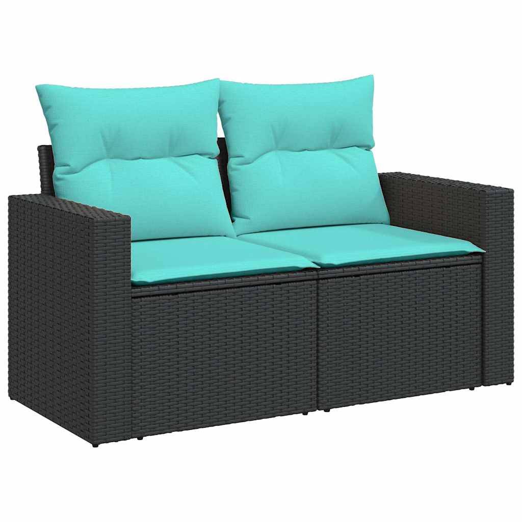 Eine schwarze Geflecht-Gartenliege mit türkisfarbenen Kissen, ausgestattet mit zwei Paaren weicher türkisfarbener Rückenkissen, geeignet für die Terrassennutzung.