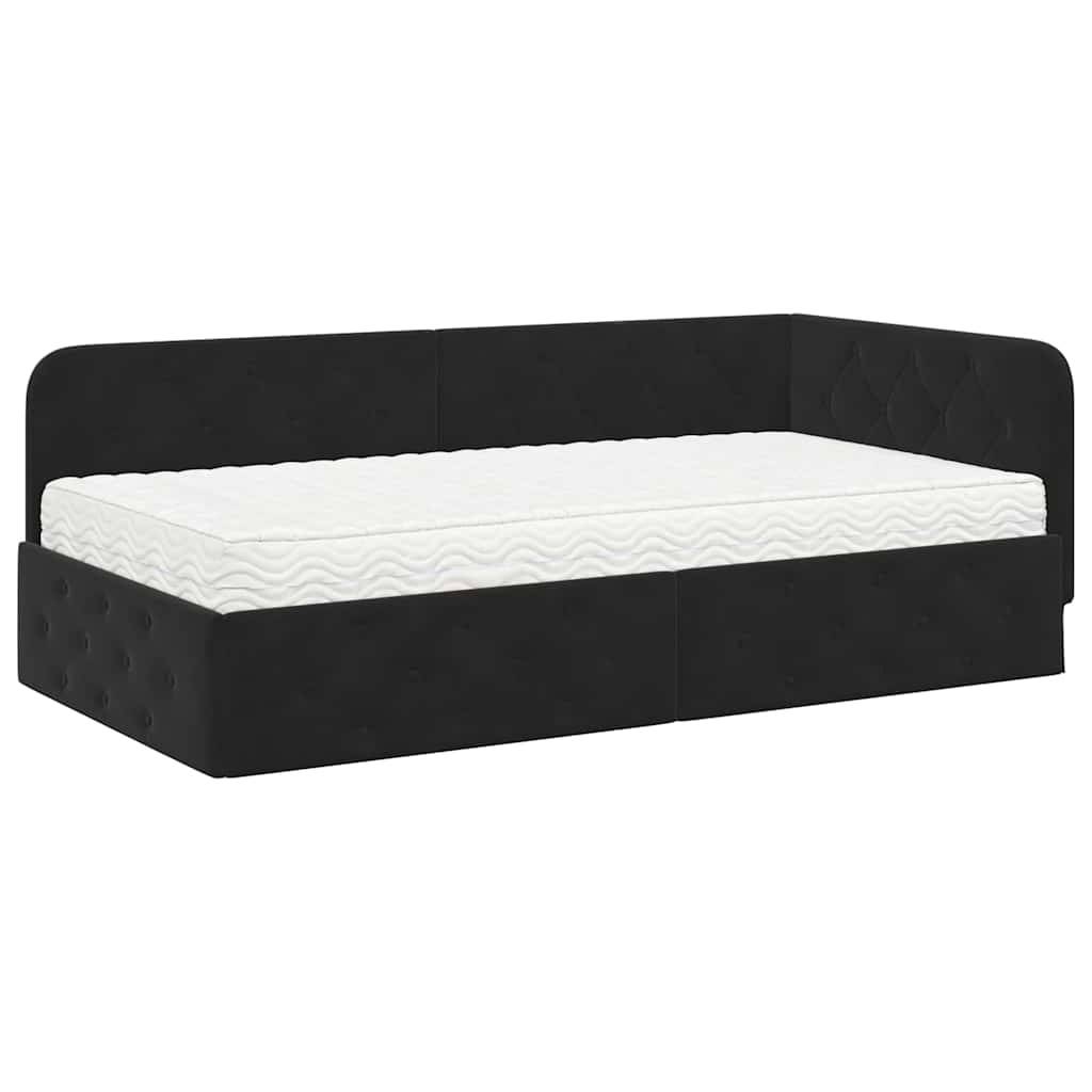 Ein schwarzes gepolstertes Tagesbett mit einer weißen Matratze, ausgestattet mit einem gesteppten Kopf- und Seitenteil, designed für moderne Schlafzimmereinrichtung.