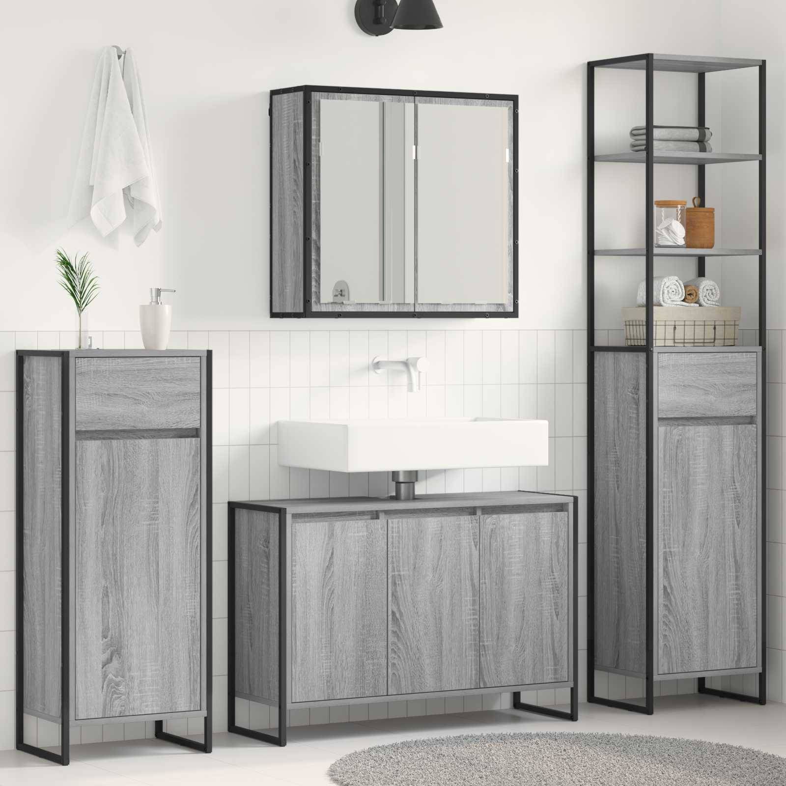 Modernes Badezimmer mit Schränken aus grauem Holz, wandmontiertem Waschbecken, Spiegelschrank und hohem Regalsystem. Weiße Fliesen und helle Wände.