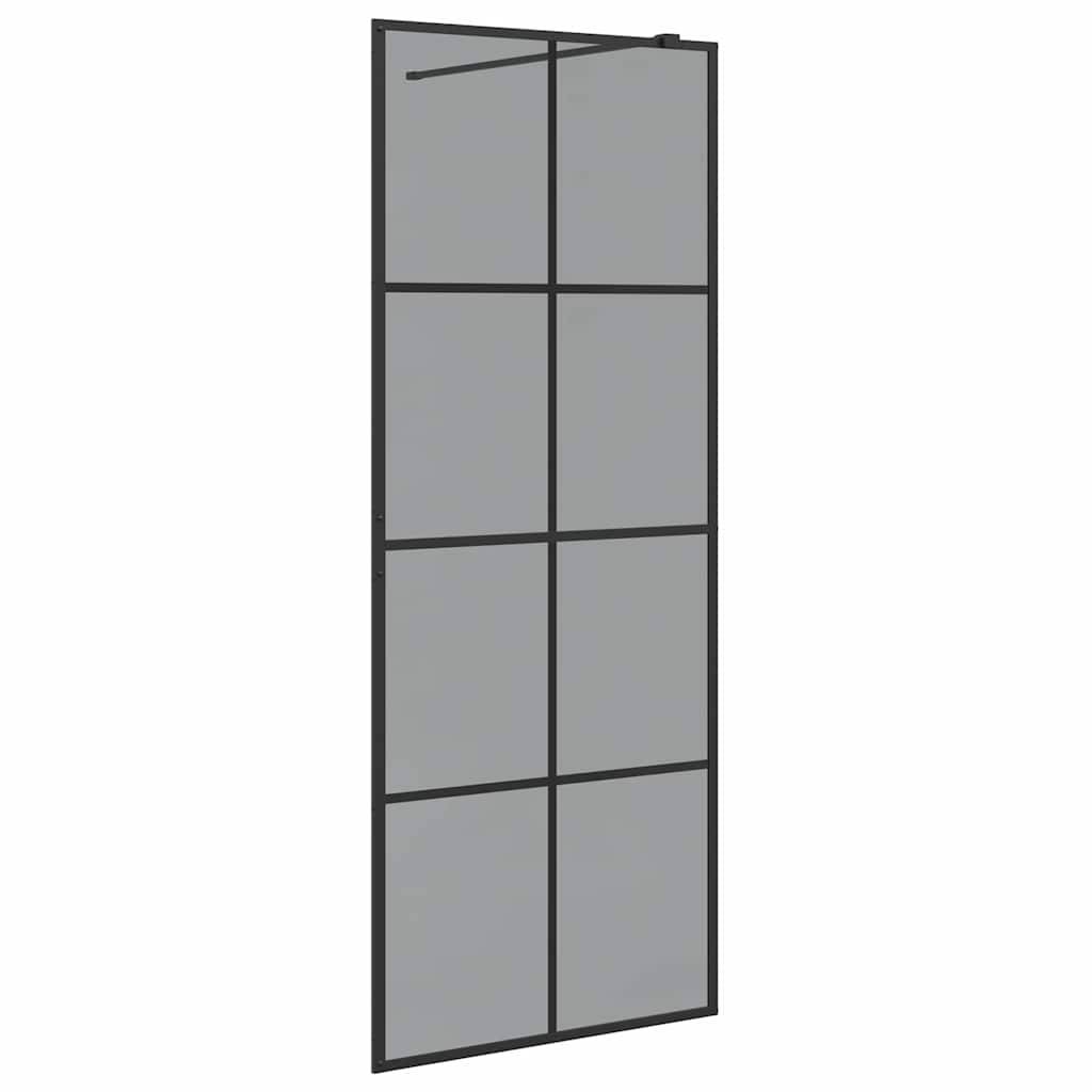 Duschabtrennungsscheibe aus Glas mit schwarzem Metallrahmen, die ein Raster aus neun rechteckigen Abschnitten aufweist. Sie ist freistehend und stilvoll.
