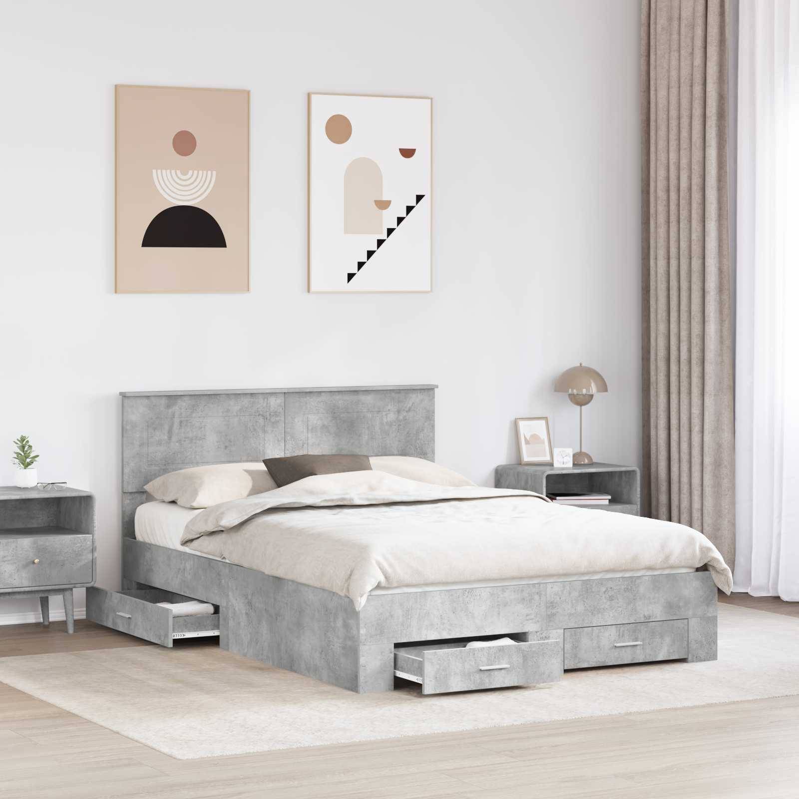 Ein modernes Schlafzimmer mit einem grauen gepolsterten Bett mit integriertem Stauraum, zwei abstrakten Kunstwerken an der Wand und einem Nachttisch mit einer Lampe.