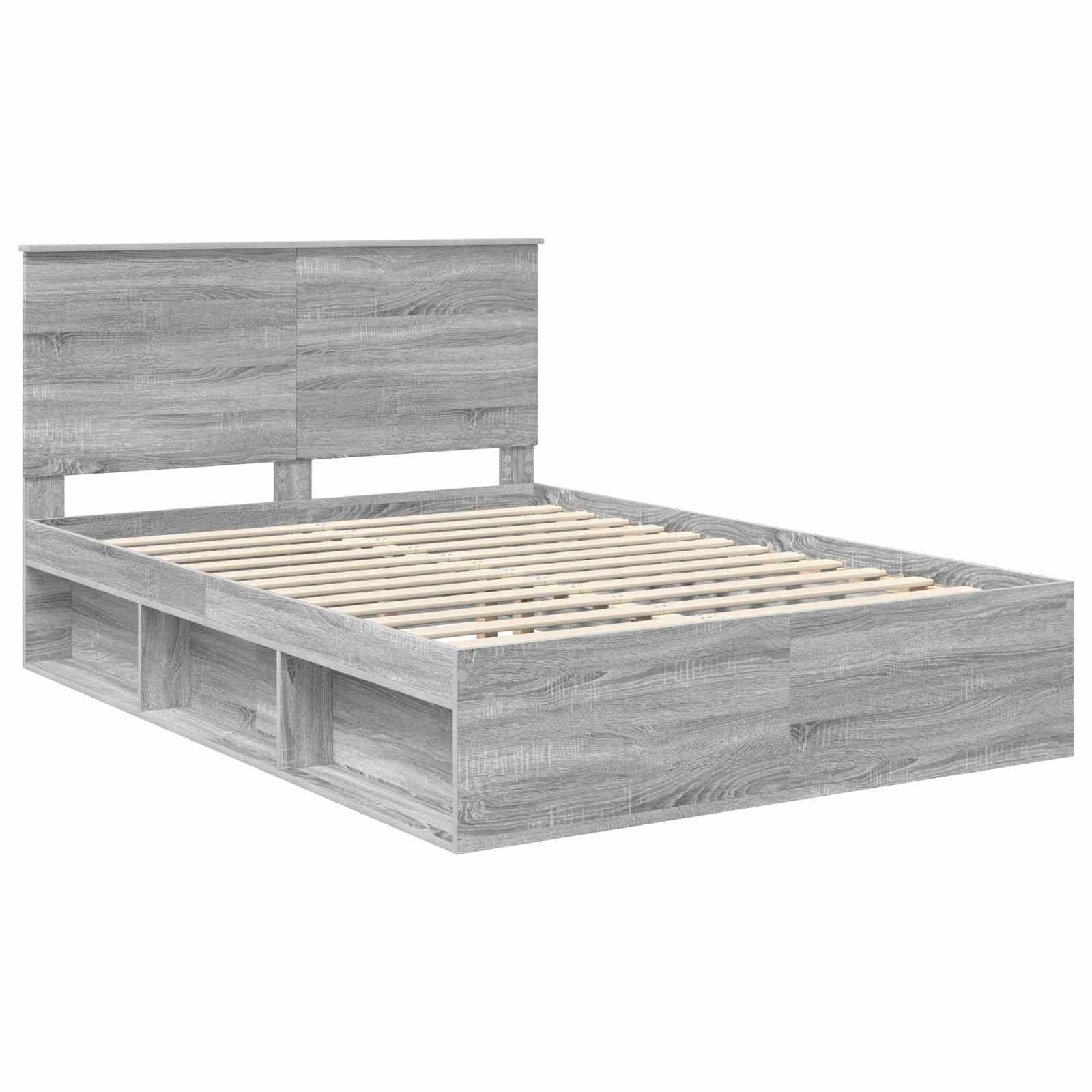 Ein Holzbettgestell mit Kopfteil, das mit einem hellen Grauton lackiert ist und seitliche Stauraumbereiche integriert hat.