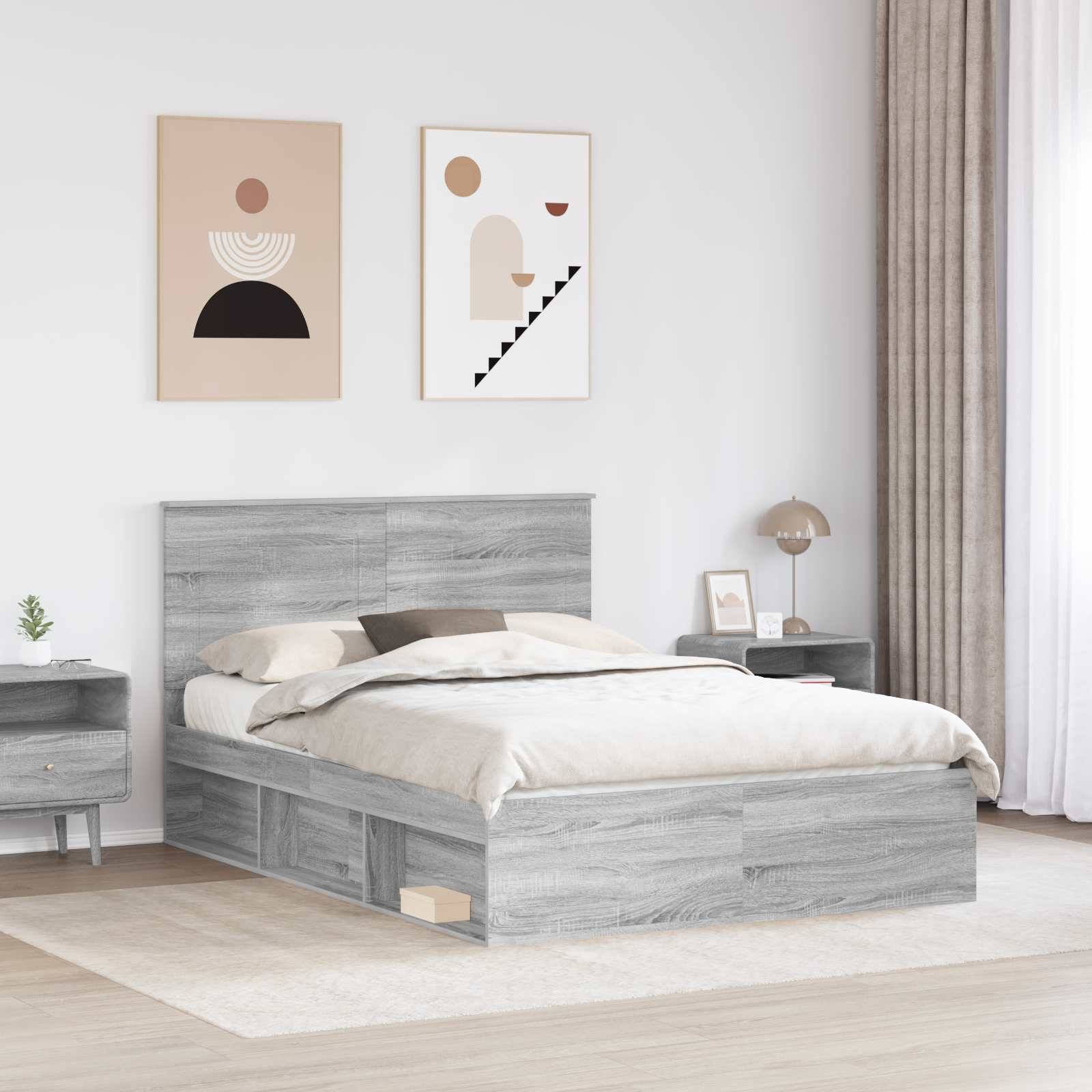 Ein modernes Schlafzimmer mit einem Bett aus grauem Holz, beigefarbener Bettwäsche, zwei abstrakten Kunstwerken darüber und einem kleinen Nachttisch mit einer Lampe rechts.
