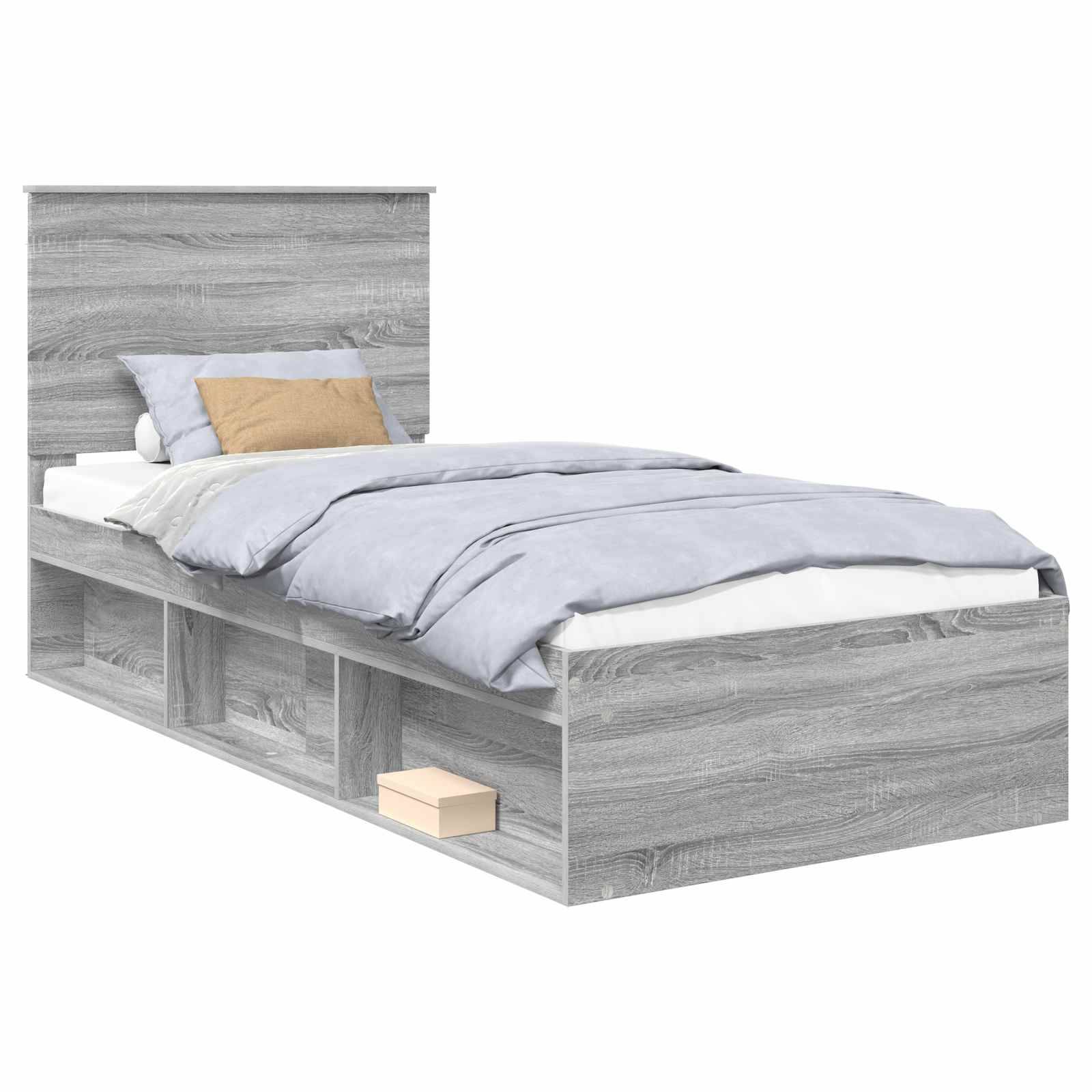 Ein grauer Holzbett mit Kopfteil, blau-graue Bettwäsche, ein beiges Kissen und Aufbewahrungsregale darunter, die eine kleine beige Box enthalten.