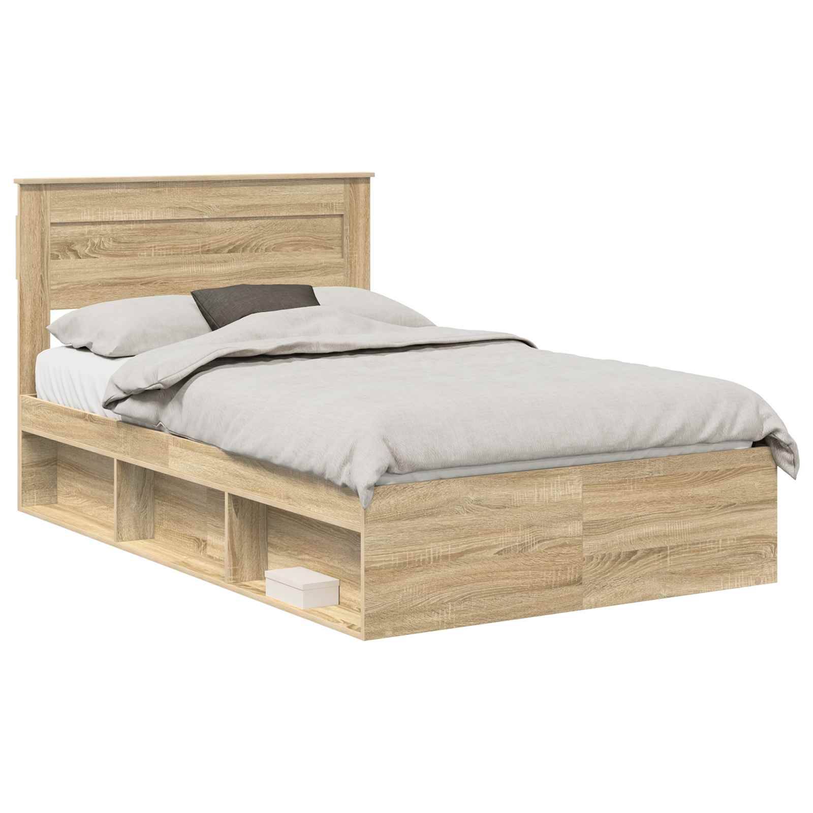Ein Holzbettgestell mit Kopfteil, seitlichen Ablagefächern und grauer Bettwäsche.