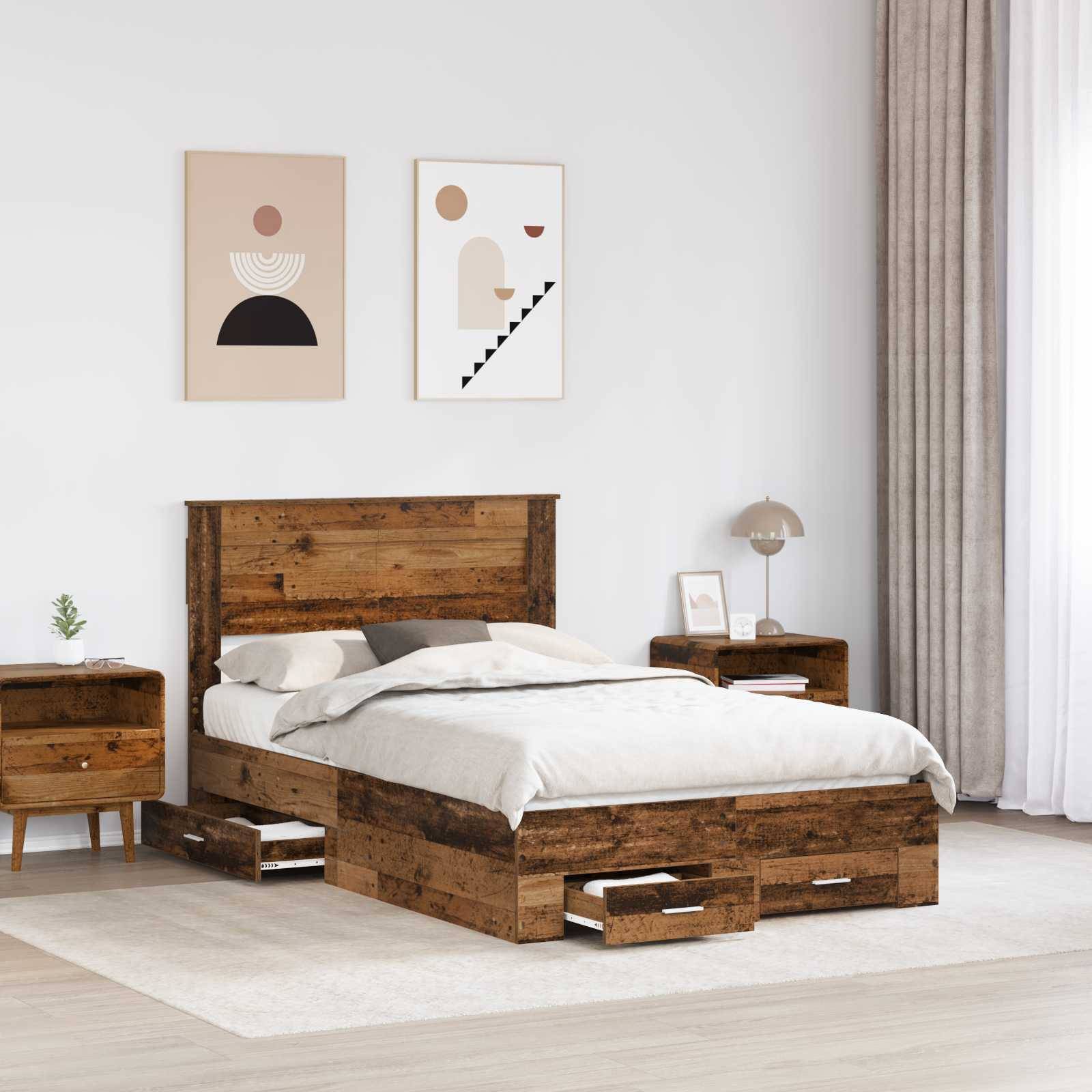 Ein rustikales Holzbett mit Schubladen zur Aufbewahrung steht in einem minimalistischen Schlafzimmer. Zwei abstrakte Kunstwerke hängen an der Wand, und ein Nachttisch mit einer Lampe und einer Pflanze steht neben dem Bett.