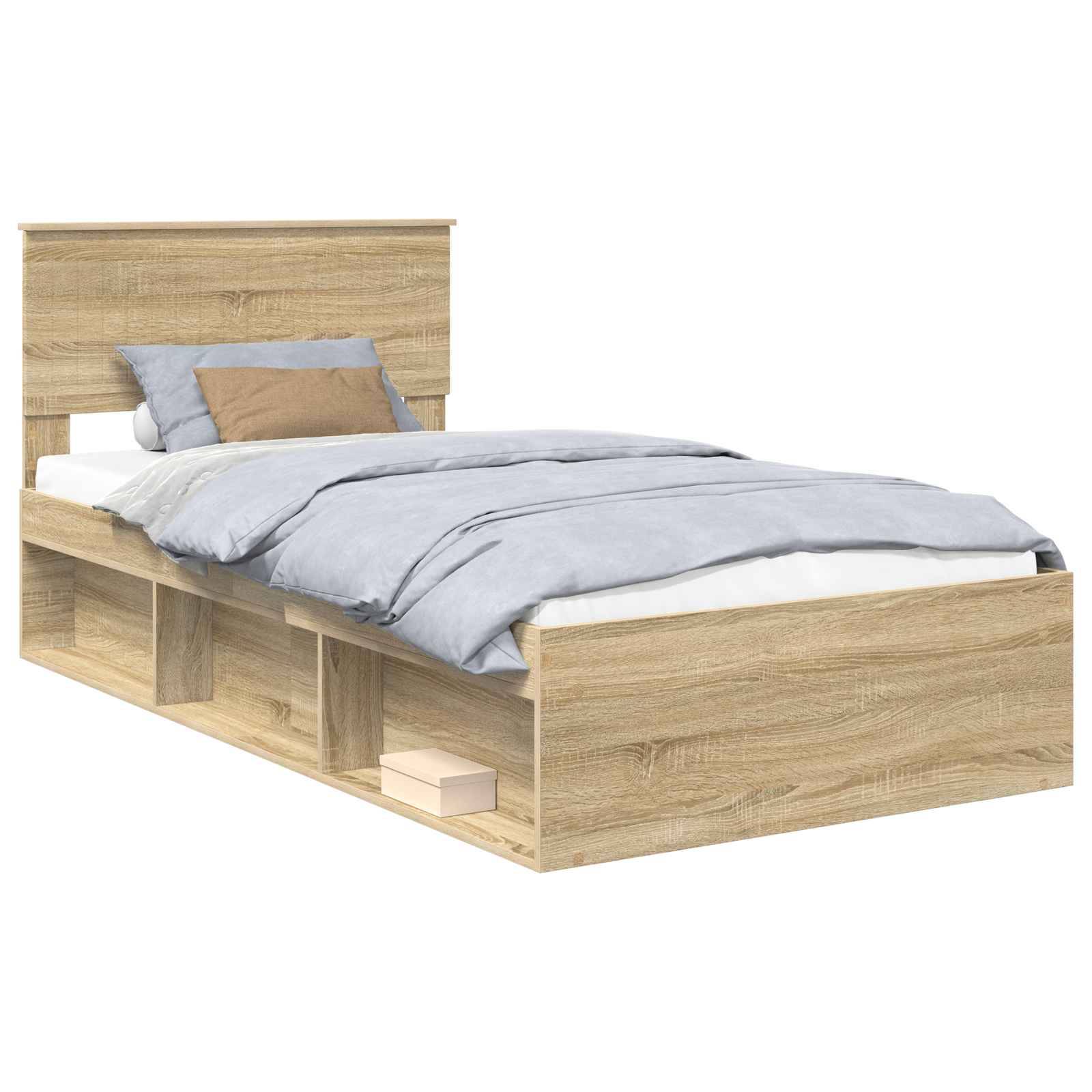 Ein Holzbettgestell mit integrierten Stauraumregalen darunter, blauer Bettwäsche und einem beigen Kissen obenauf.