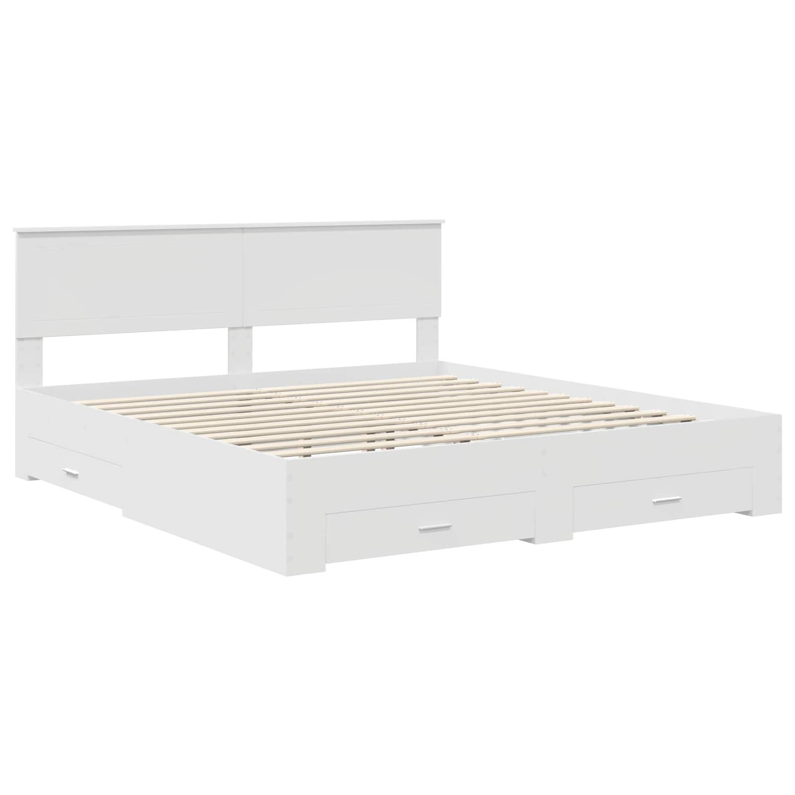 Ein weißer Holzbettrahmen mit Lattenrost und zwei großen Aufbewahrungsschubladen darunter. Der Kopfteil ist schlicht und rechteckig.