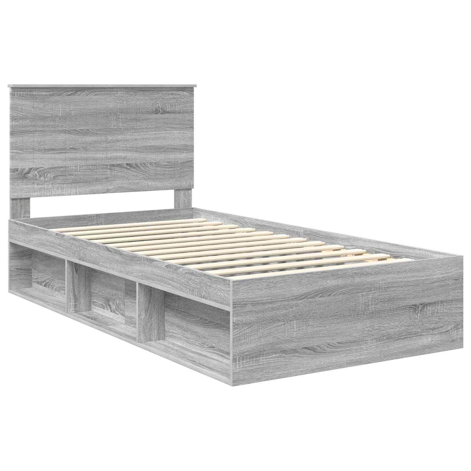 Ein grauer Holzbettrahmen mit hohem Kopfteil und Stauraumregalen unter dem Bett. Die Lattenrost ist sichtbar und für eine Matratze konzipiert.