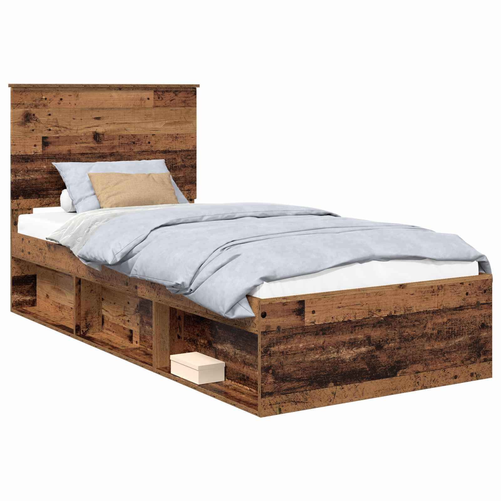 Ein einzelner Holzbettrahmen mit integrierten Stauraummöglichkeiten, ausgestattet mit hellblauen Bettwäsche und einem beigen Kissen, von einem Winkel aus betrachtet.
