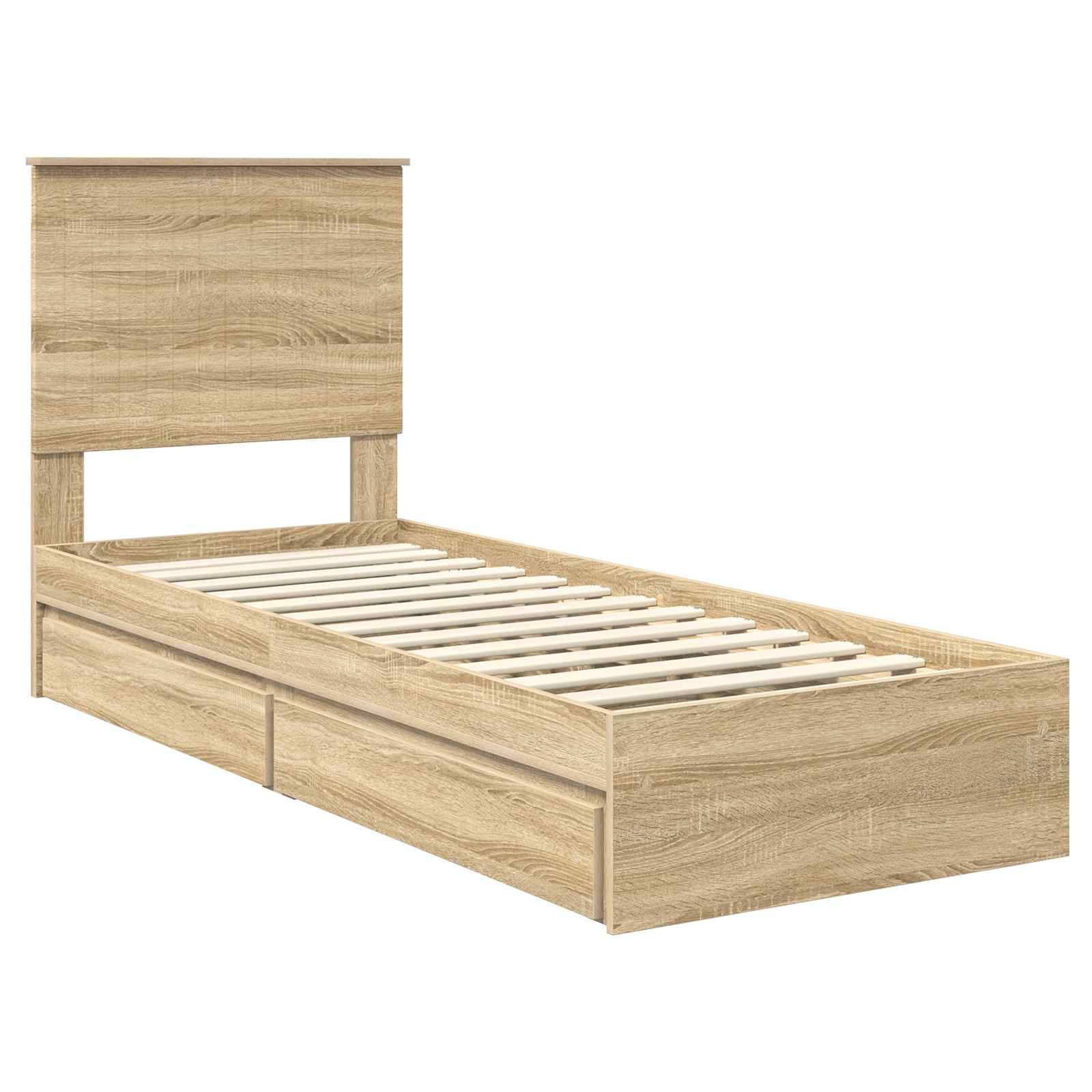 Ein Holz-Einzelbettrahmen mit Kopfteil und zwei Staurageschubladen an einer Seite. Aus hellem Holz gefertigt.