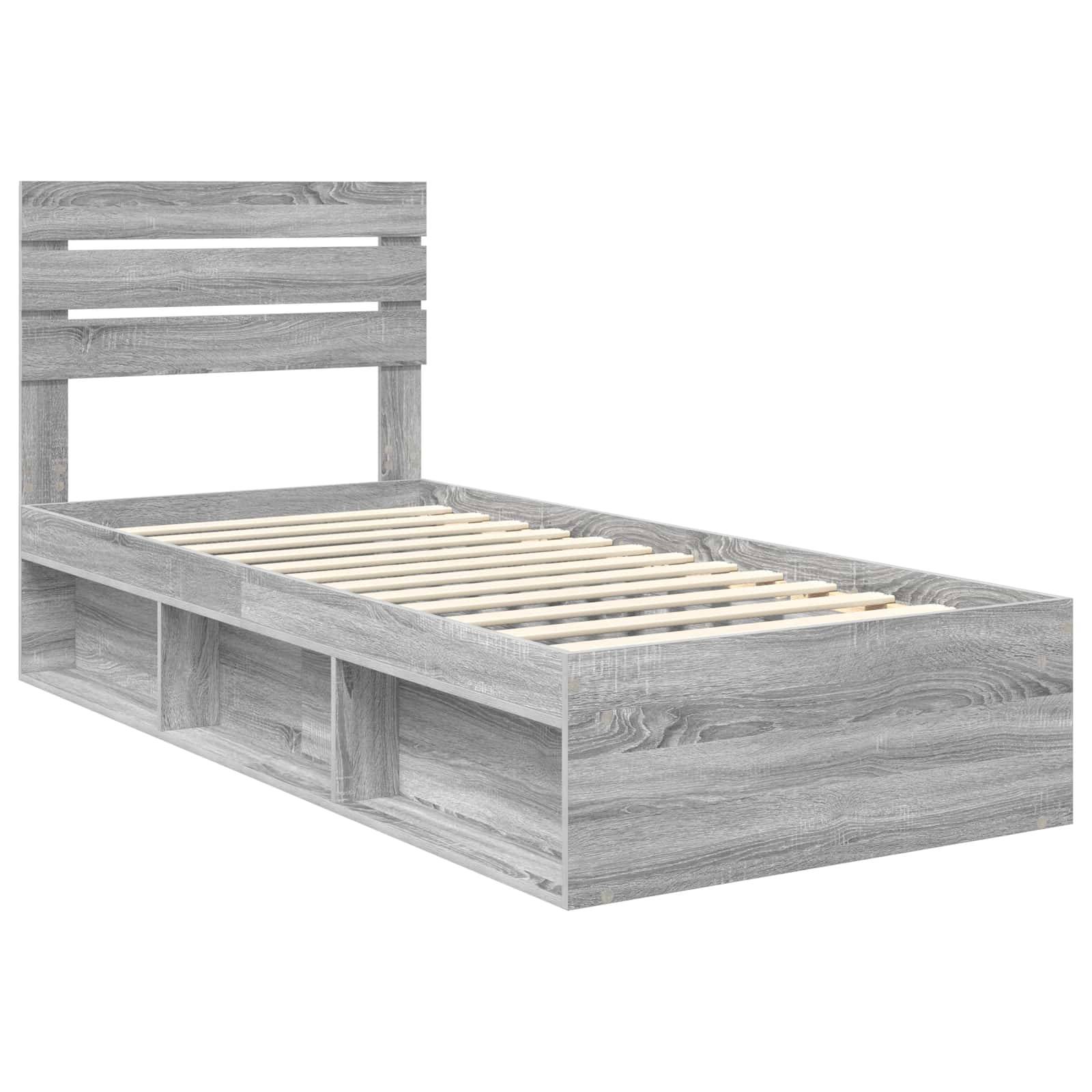 Graues Holz-Zwillingsbett-Gestell mit Latten und eingebauten Ablageregalen an der Seite. Minimalistisches Design, das sich in verschiedene Raumstile einfügt.