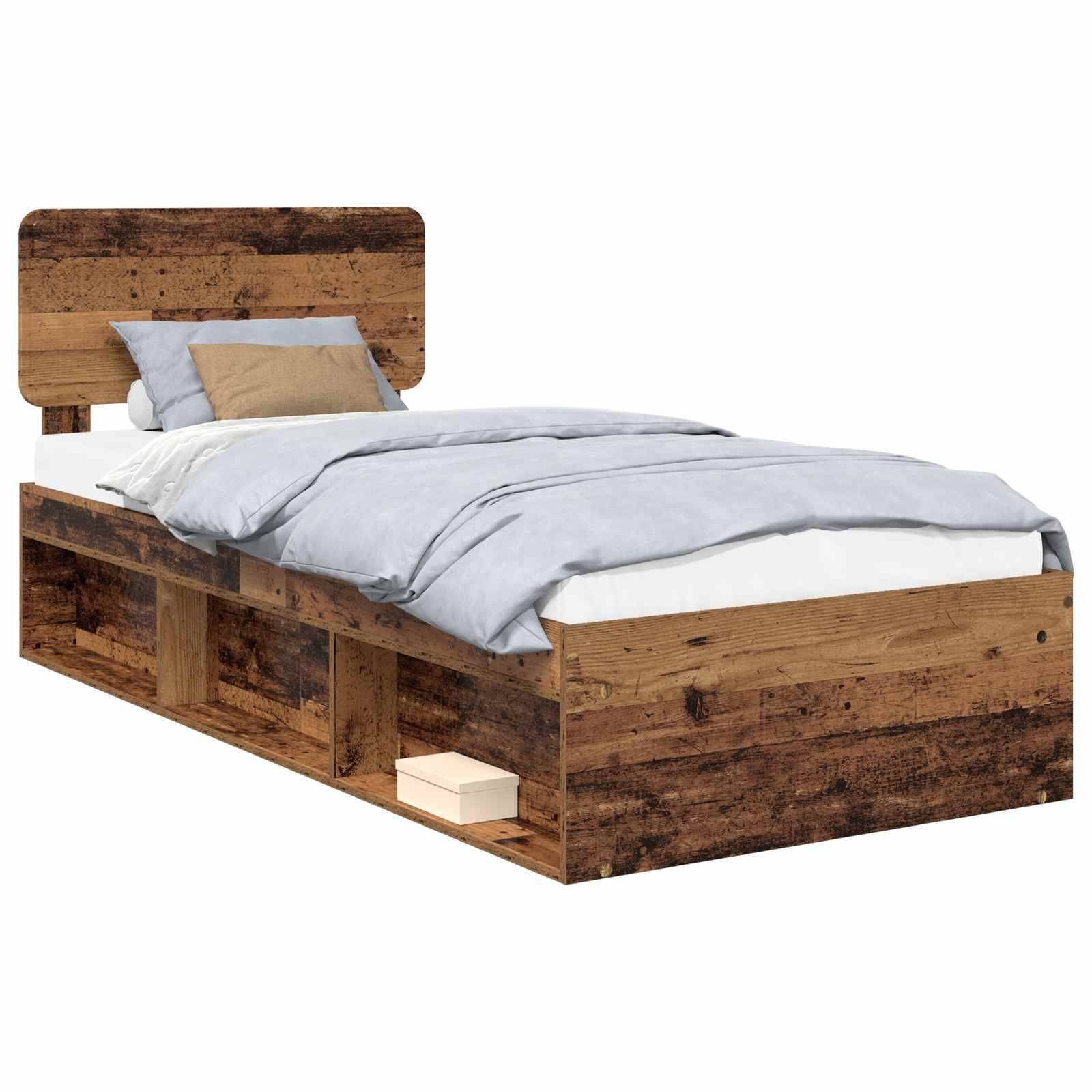 Ein Holz-Einzelbett mit Kopfteil und blauer Bettwäsche. Es verfügt über Stauraum an den Seiten, in dem ein Buch und dekorative Kissen aufbewahrt werden.