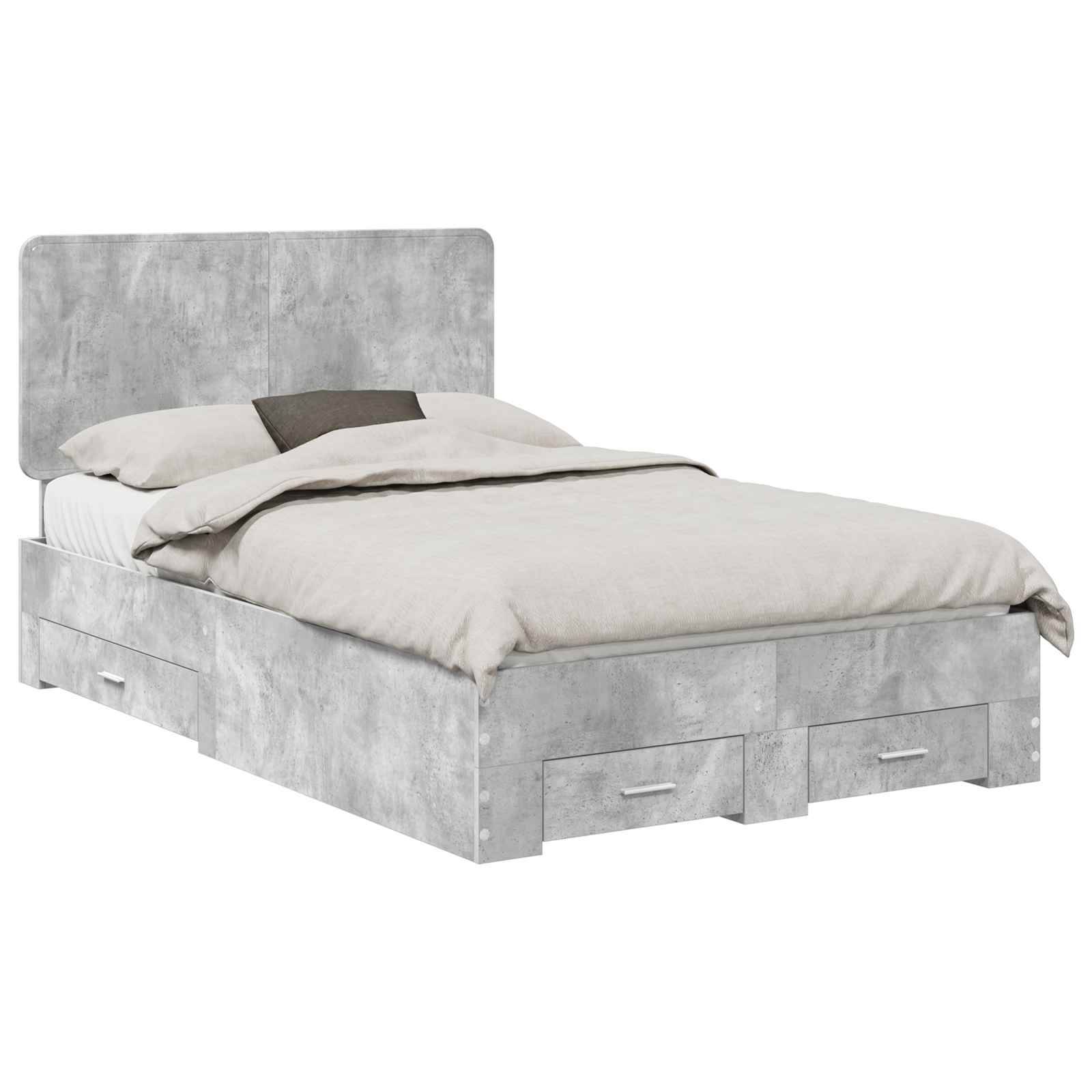 Ein graues Einzelbett mit Kopfteil und zwei eingebauten Schubladenfächern darunter, ordentlich gemacht mit hellfarbiger Bettwäsche und einem Kissen.