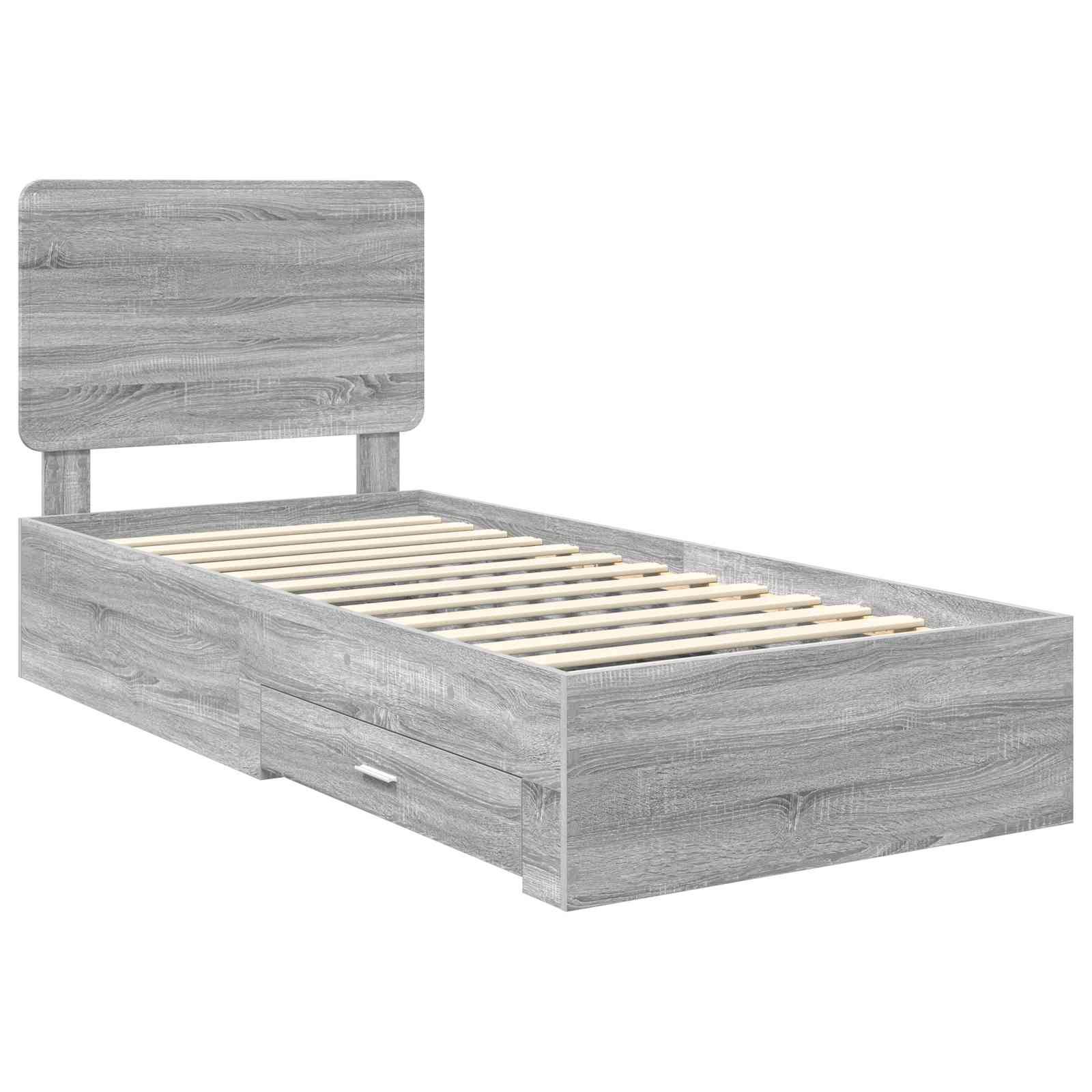 Ein grauer Holz-Einzelbettrahmen mit Kopfteil und zwei Schubladen darunter, konzipiert für Stauraum und Platzersparnis im Schlafzimmer.