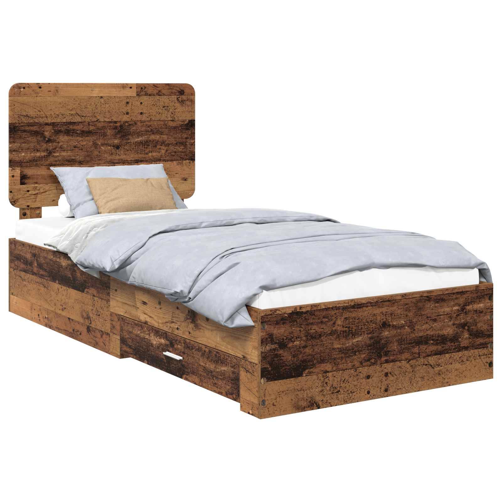 Ein hölzernes Einzelbett mit Kopfteil, ausgestattet mit einer hellgrauen Tagesdecke, weißen Betttüchern und einem beigen Akzentkissen. Das Bett verfügt über Schubladen zur Aufbewahrung.
