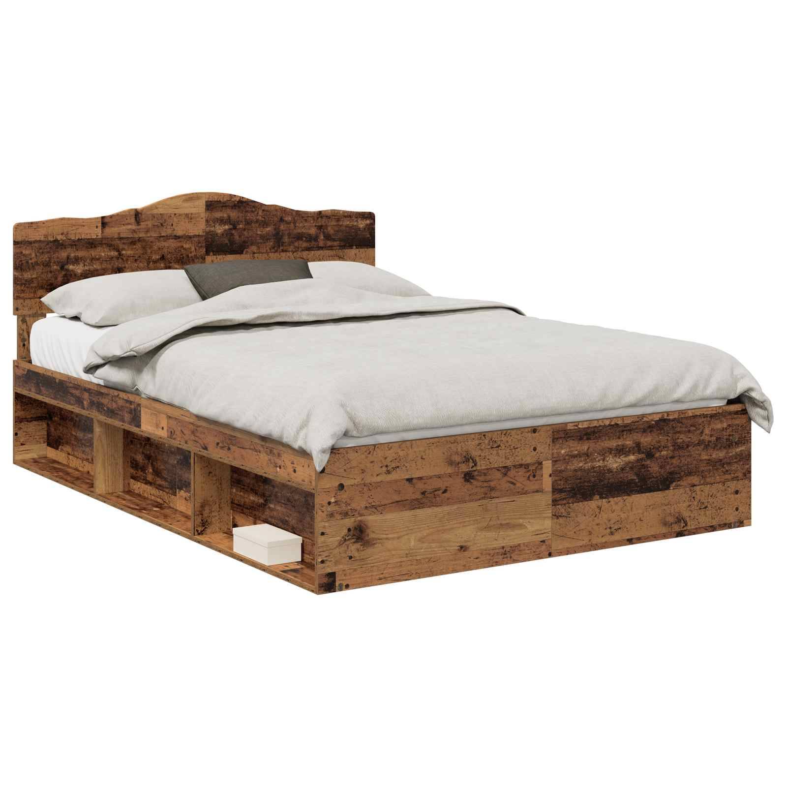 Ein Holzbettgestell mit Kopfteil und Stauraumfächern darunter, ausgestattet mit weißer Bettwäsche und einem grauen Kissen.