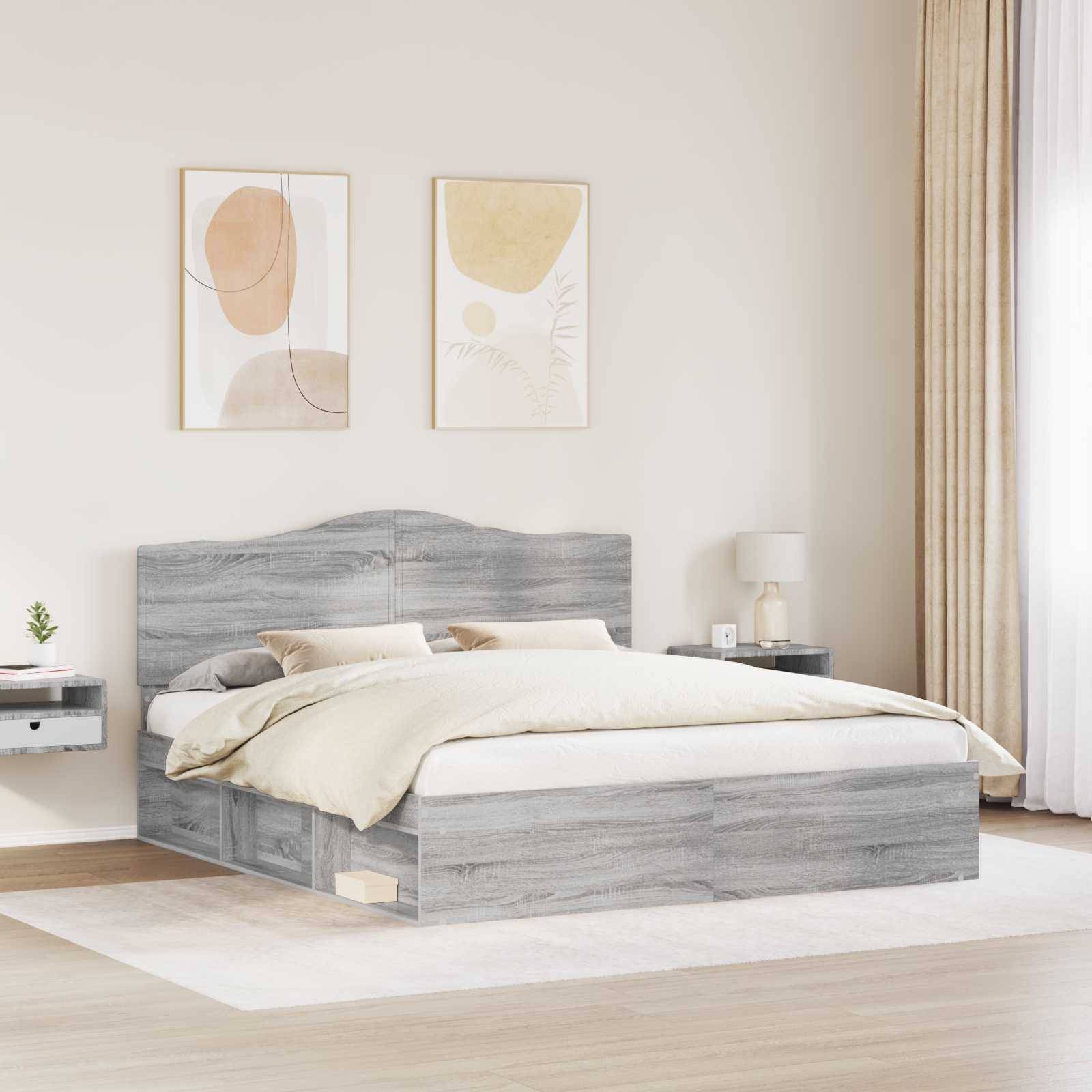 Ein modernes Schlafzimmer mit einem grauen Holzbett, beigefarbener Bettwäsche, zwei abstrakten Kunstwerken an der Wand und einem kleinen Nachttisch mit einer Lampe.