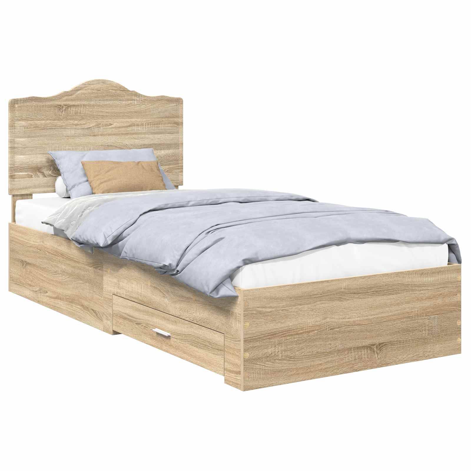 Ein Holzbett mit Kopfteil, hellgrauer Bettwäsche und zwei Schubladen darunter.
