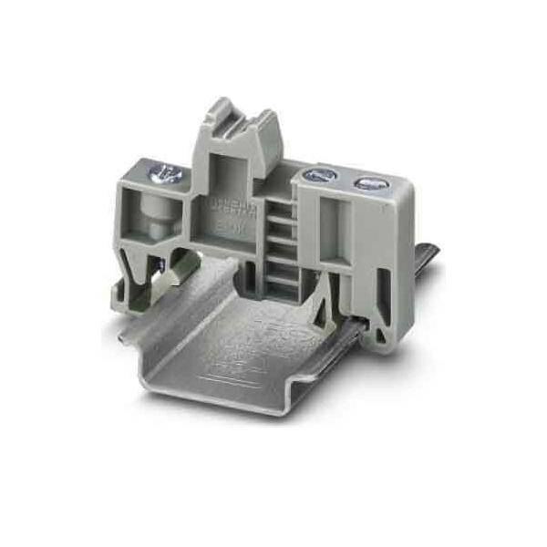 Ein Nahaufnahmebild eines grauen elektrischen Klemmenblocks, der zum Anschließen und Sichern von elektrischen Drähten verwendet wird und verschiedene Anschlusspunkte zeigt.