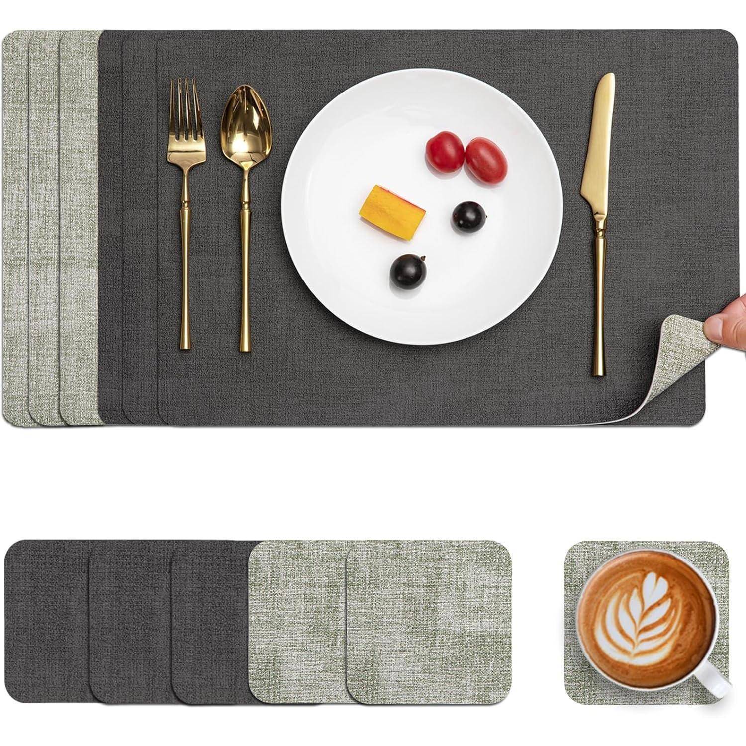Ein sorgfältig gedeckter Esstisch mit goldenem Besteck, einem weißen Teller mit Käse und Tomaten, grauen strukturierten Platzdeckchen und einem Latte mit Blattkunst.