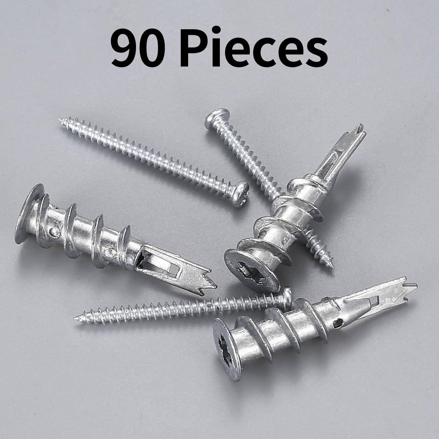90 Teile' Metallschrauben und Dübel, auf einer grauen Oberfläche dargestellt.