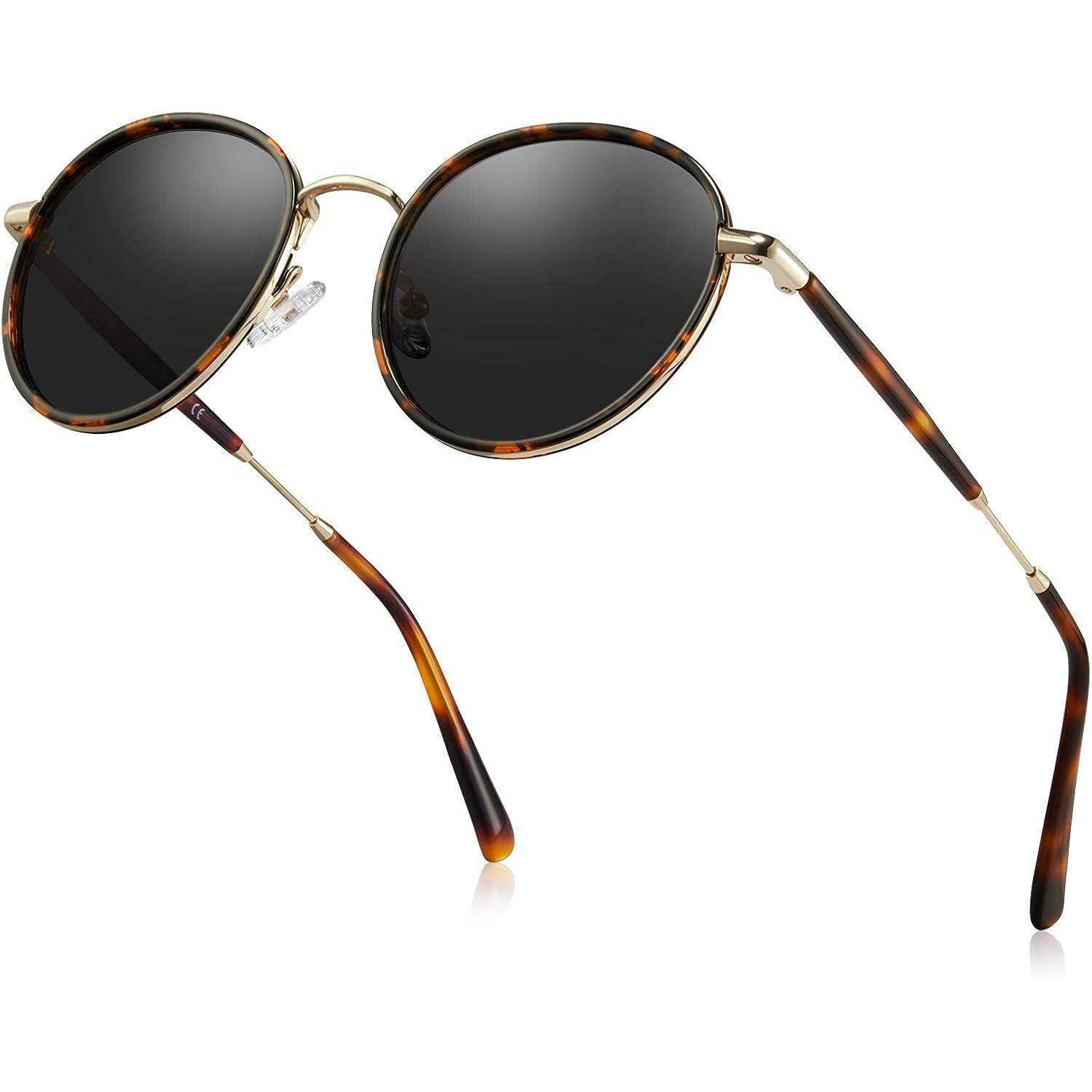 Sonnenbrille mit runden, dunklen Gläsern und einem Schildpatt-Rahmen.