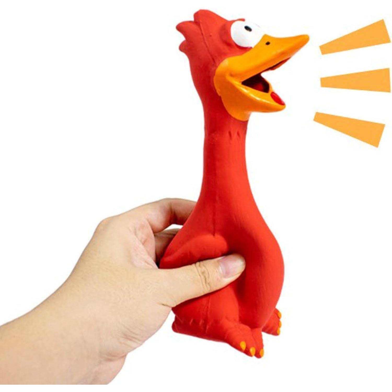 Eine Hand drückt eine rote Gummihühnerspielzeug, das einen großen Schnabel und Augen hat, wodurch es so aussieht, als würde es laut krächzen.