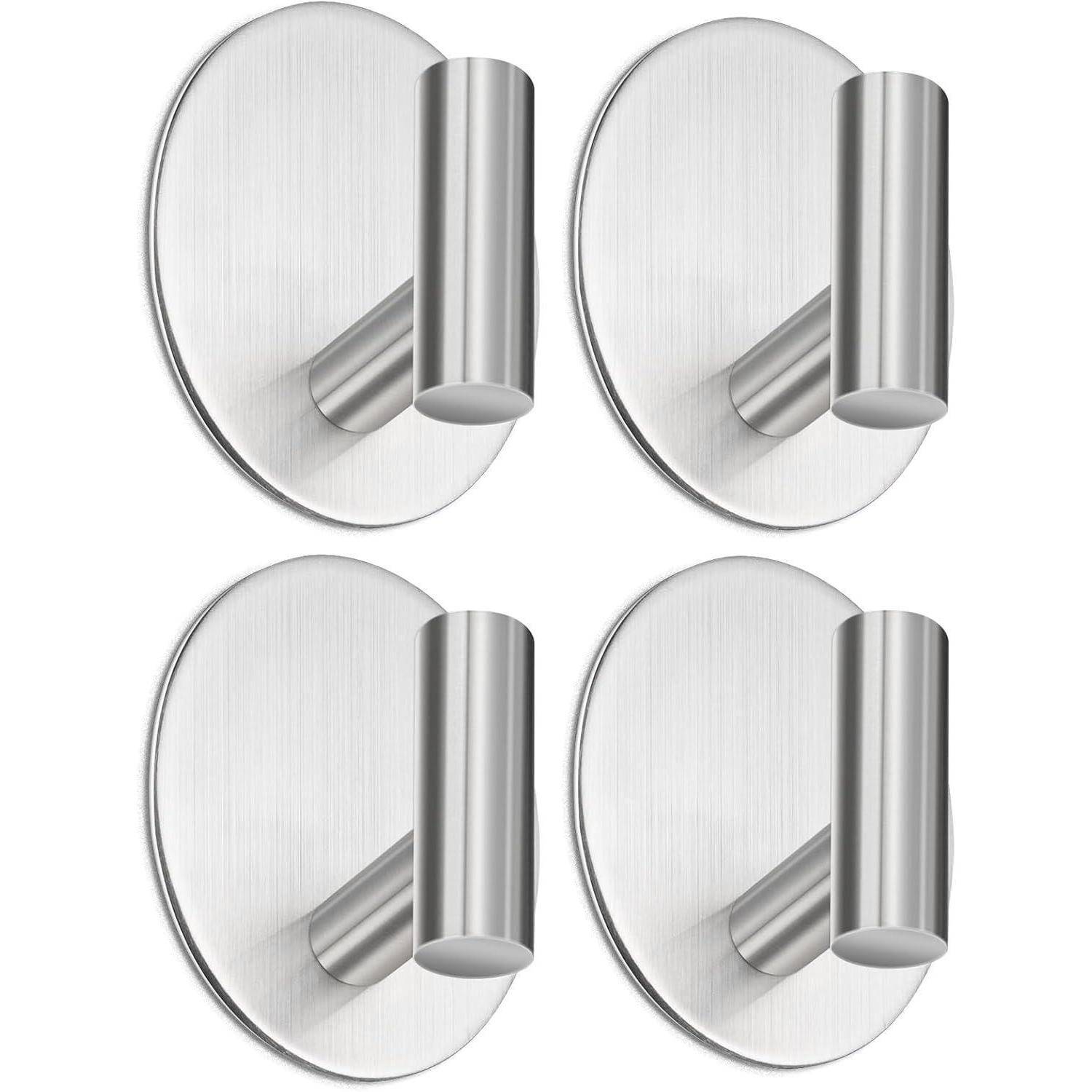 Vier Metall-Wandhaken, die auf runden Rückplatten montiert sind und in einem 2x2-Raster angeordnet sind.